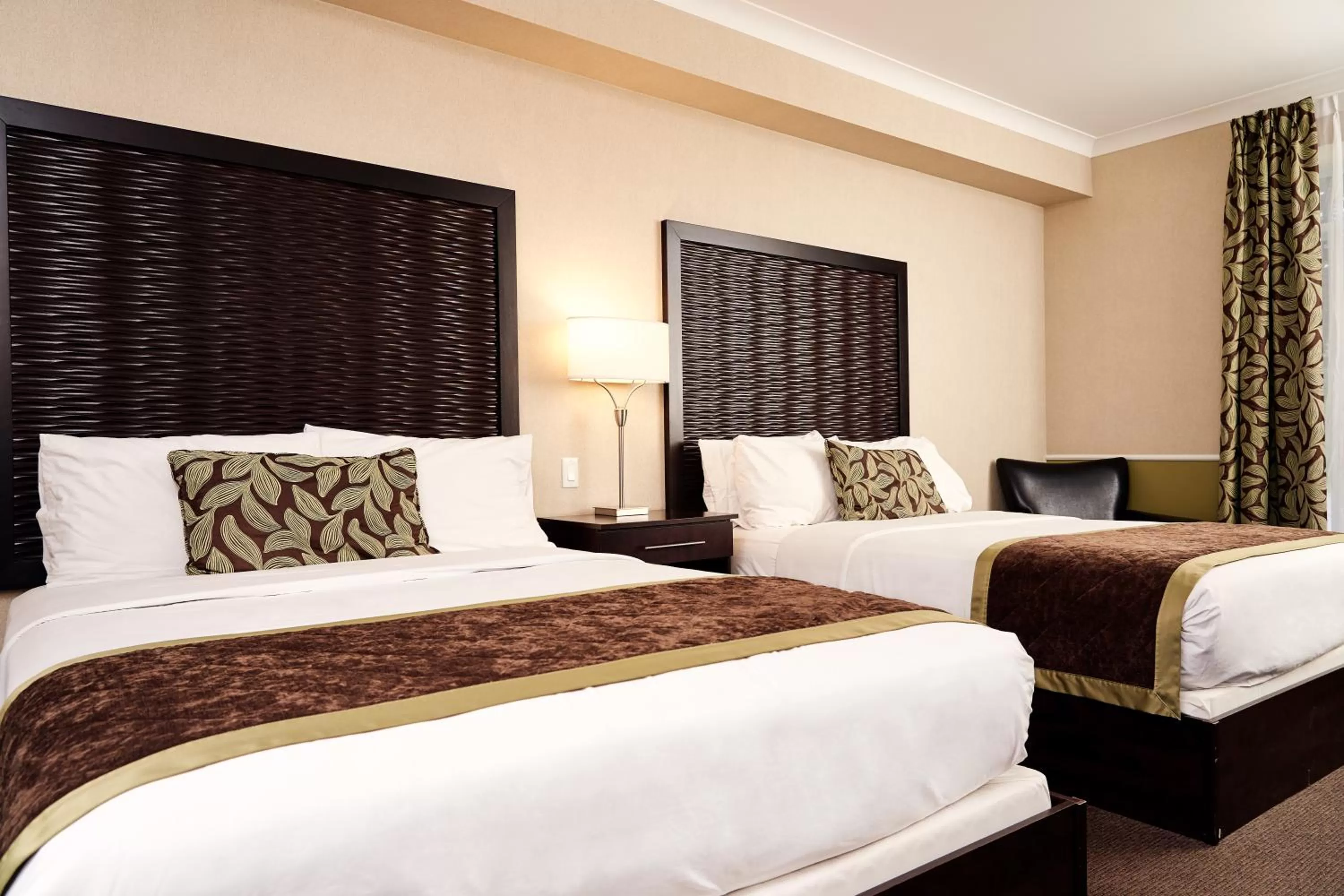 Bed in RiverRock Inn