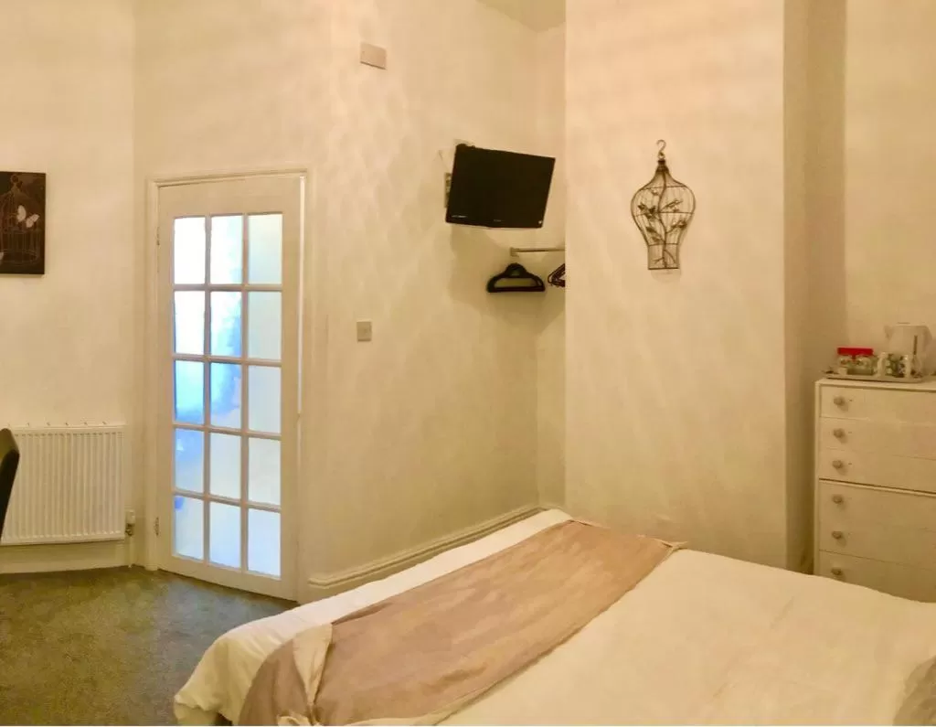 Bed in Admiral Guest House