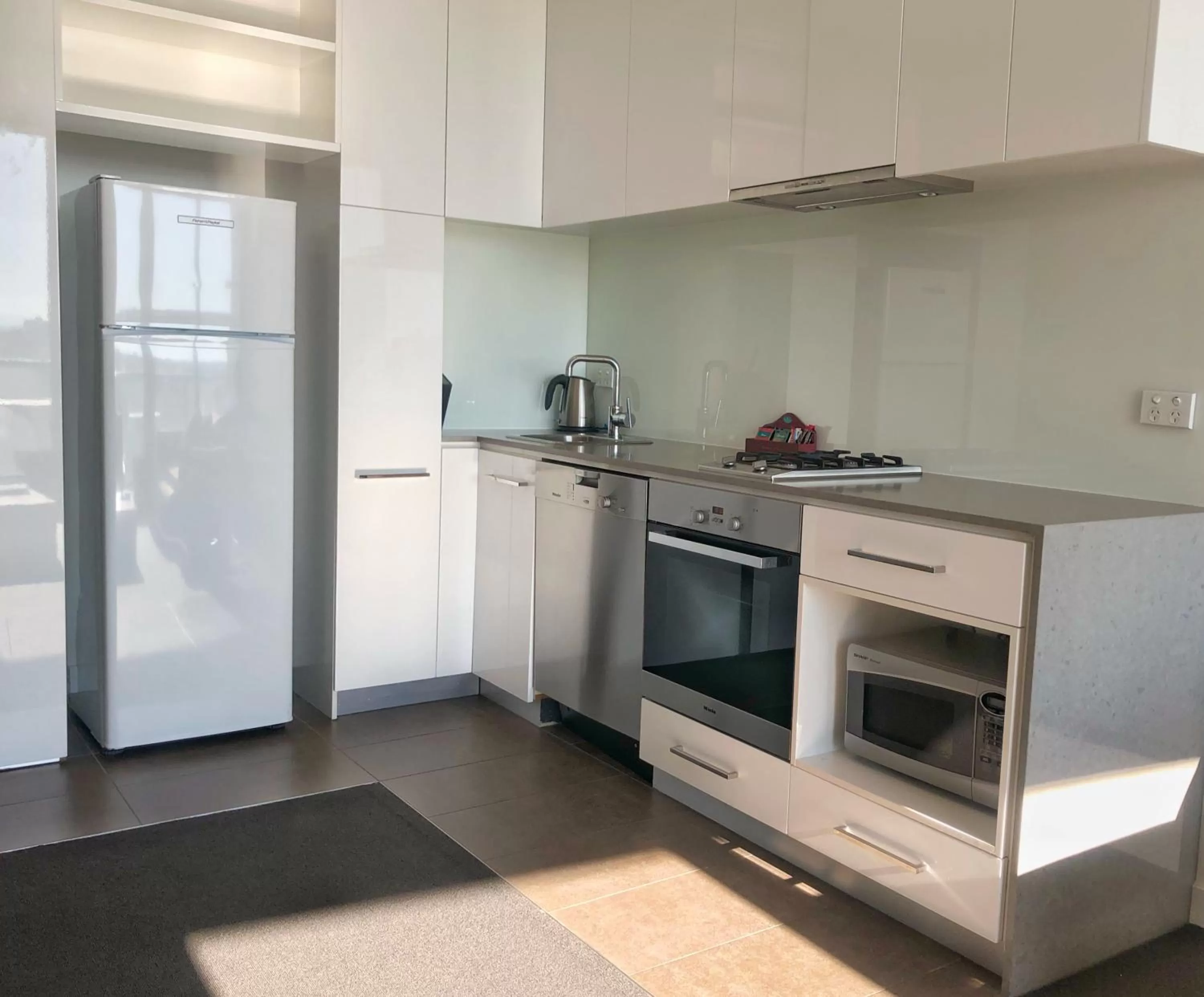 kitchen in The Sebel Residences Melbourne Docklands Serviced Apartments