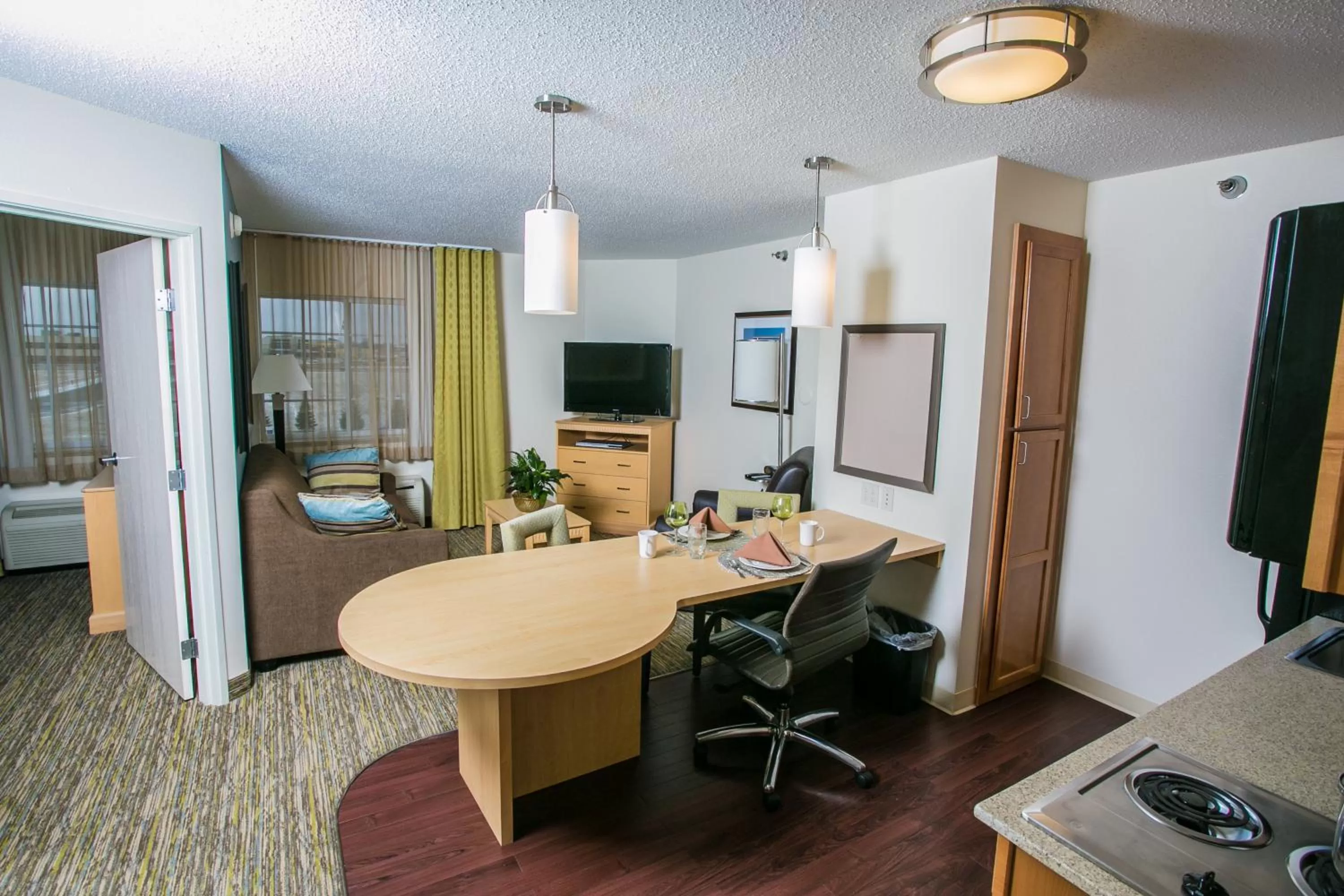 Photo of the whole room, Bed in Candlewood Suites Fargo-North Dakota State University by IHG