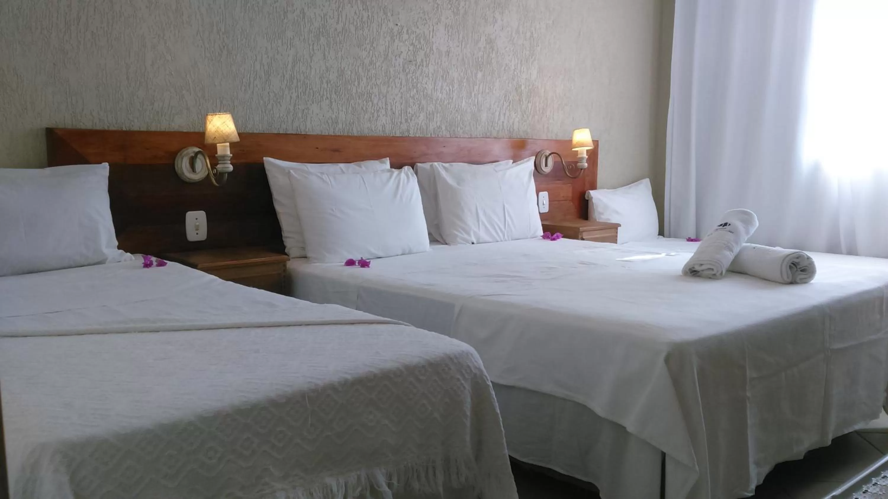 Bed in Pousada Praia João Fernandes