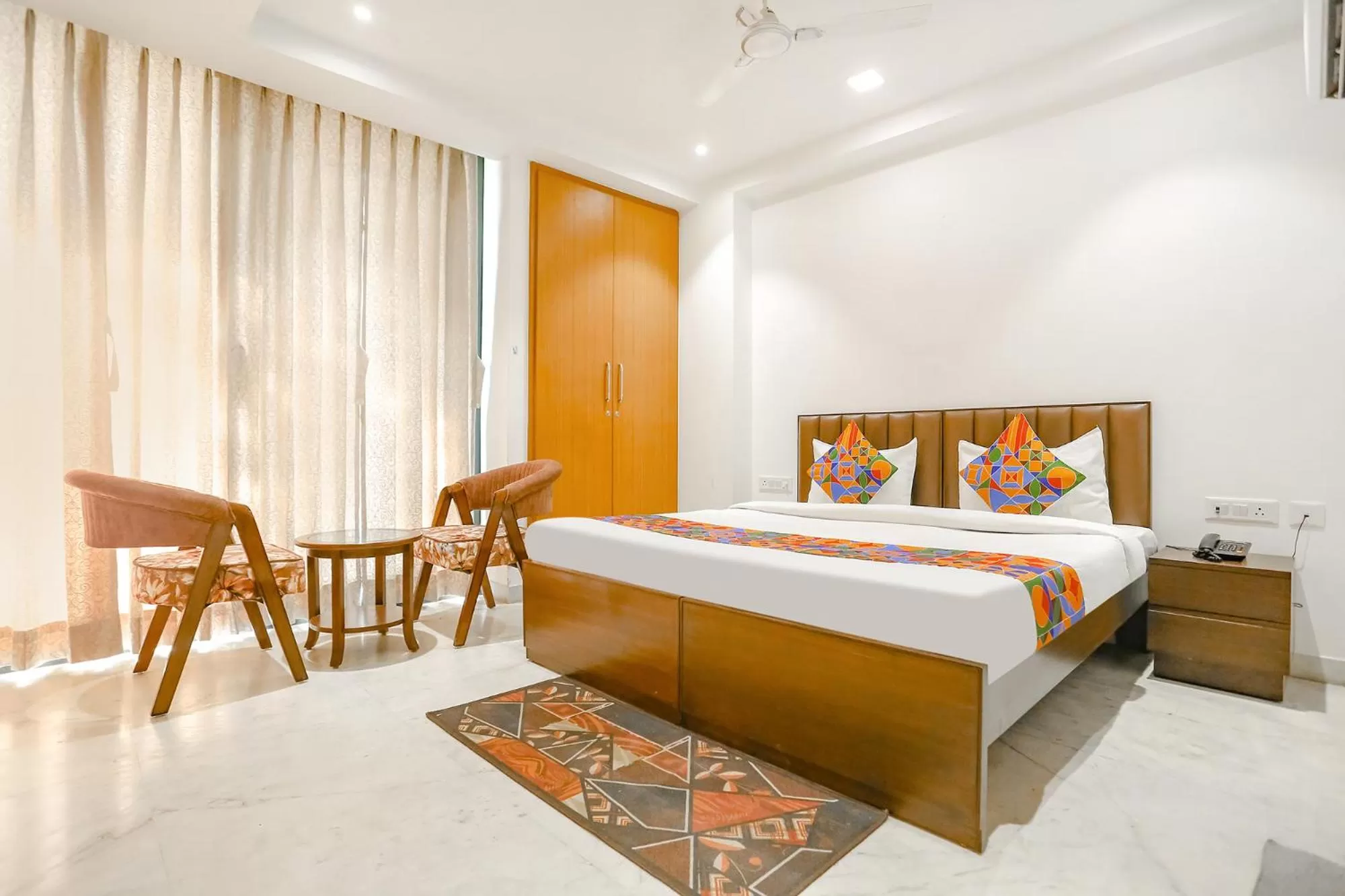 Bedroom in FabExpress Aerosky Deluxe - Nr Yashobhoomi Convention Centre