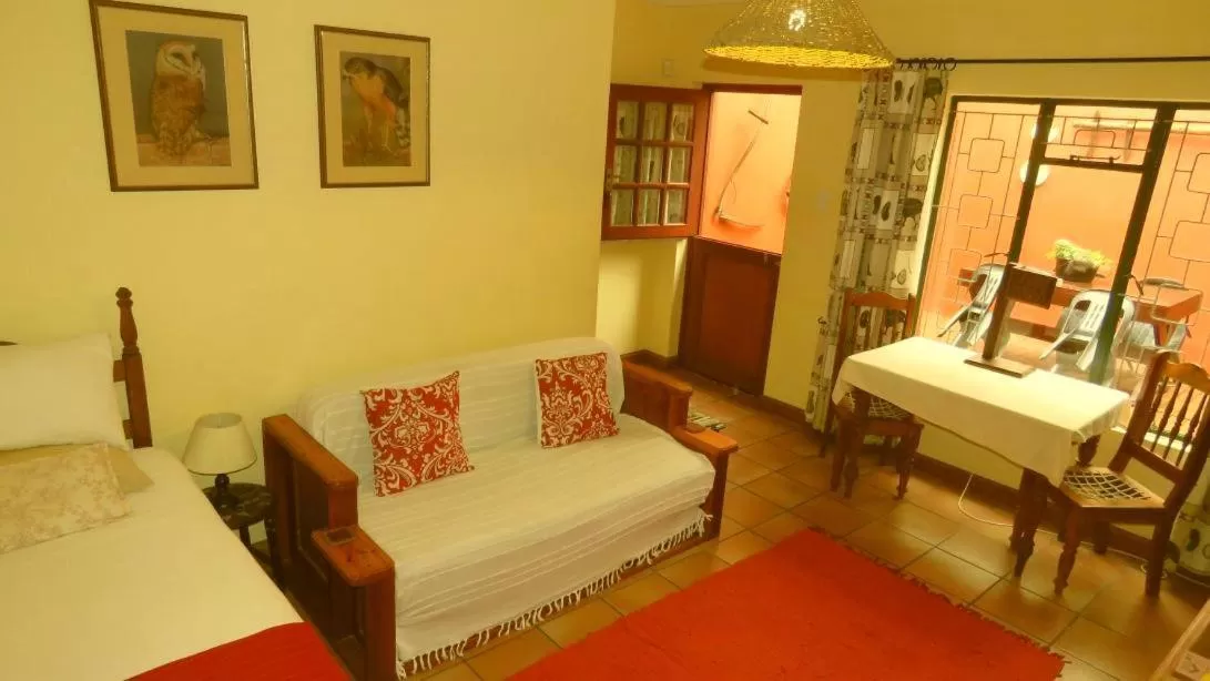 Seating area, Bed in The Farmhouse B&B