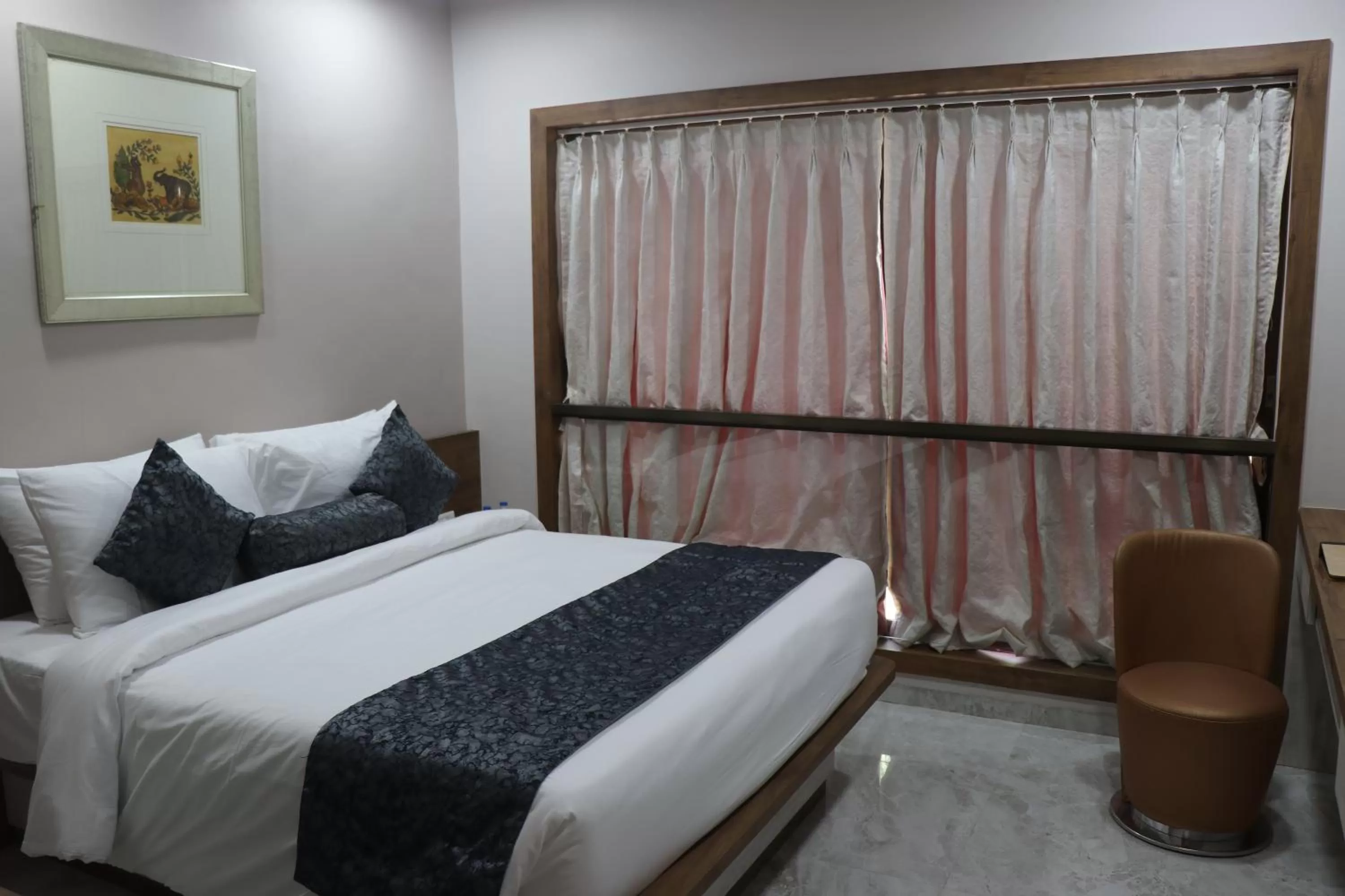 Bedroom, Bed in Nest Beacon Resort Daman