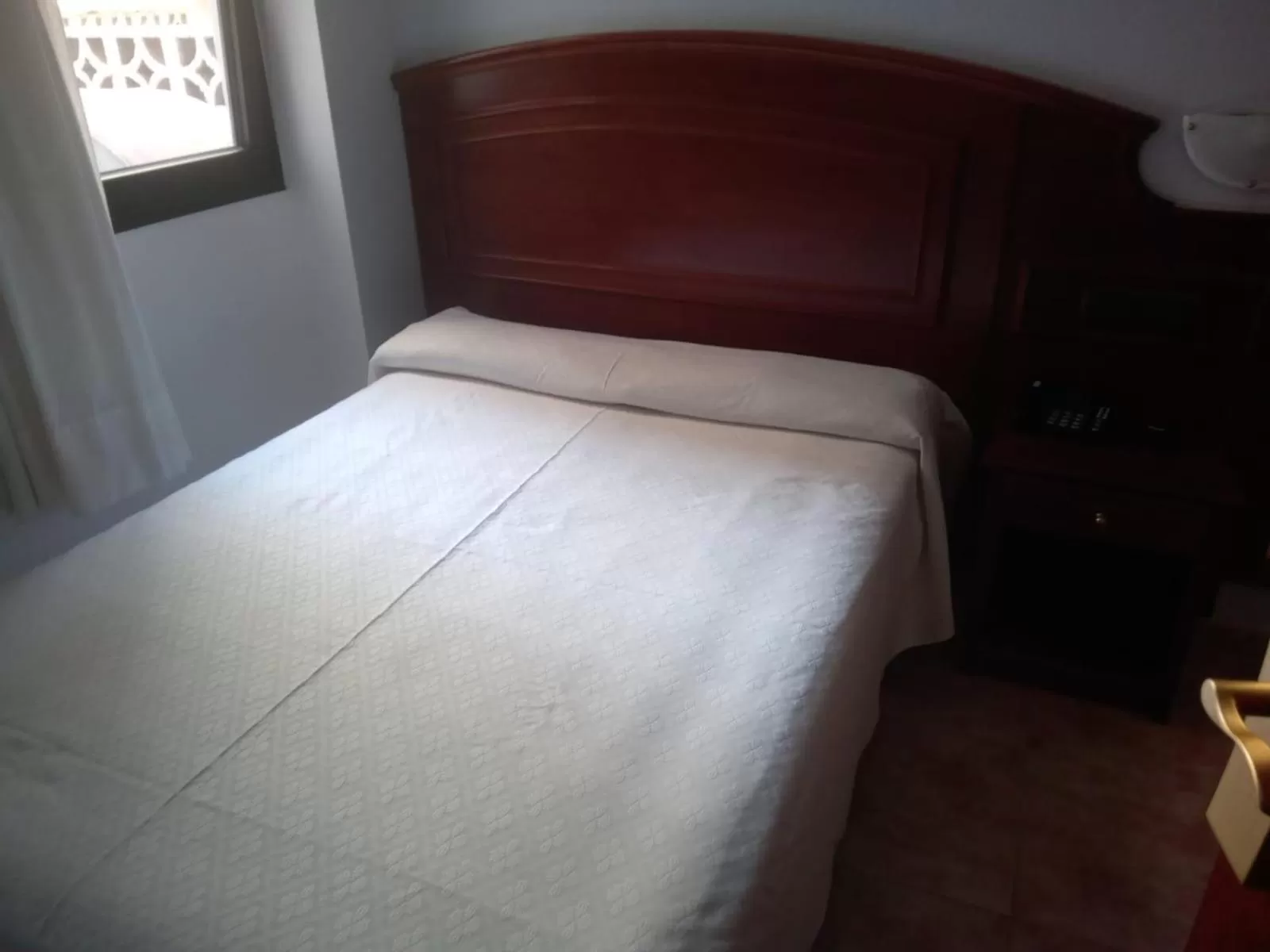 Bed in Hotel Tropical