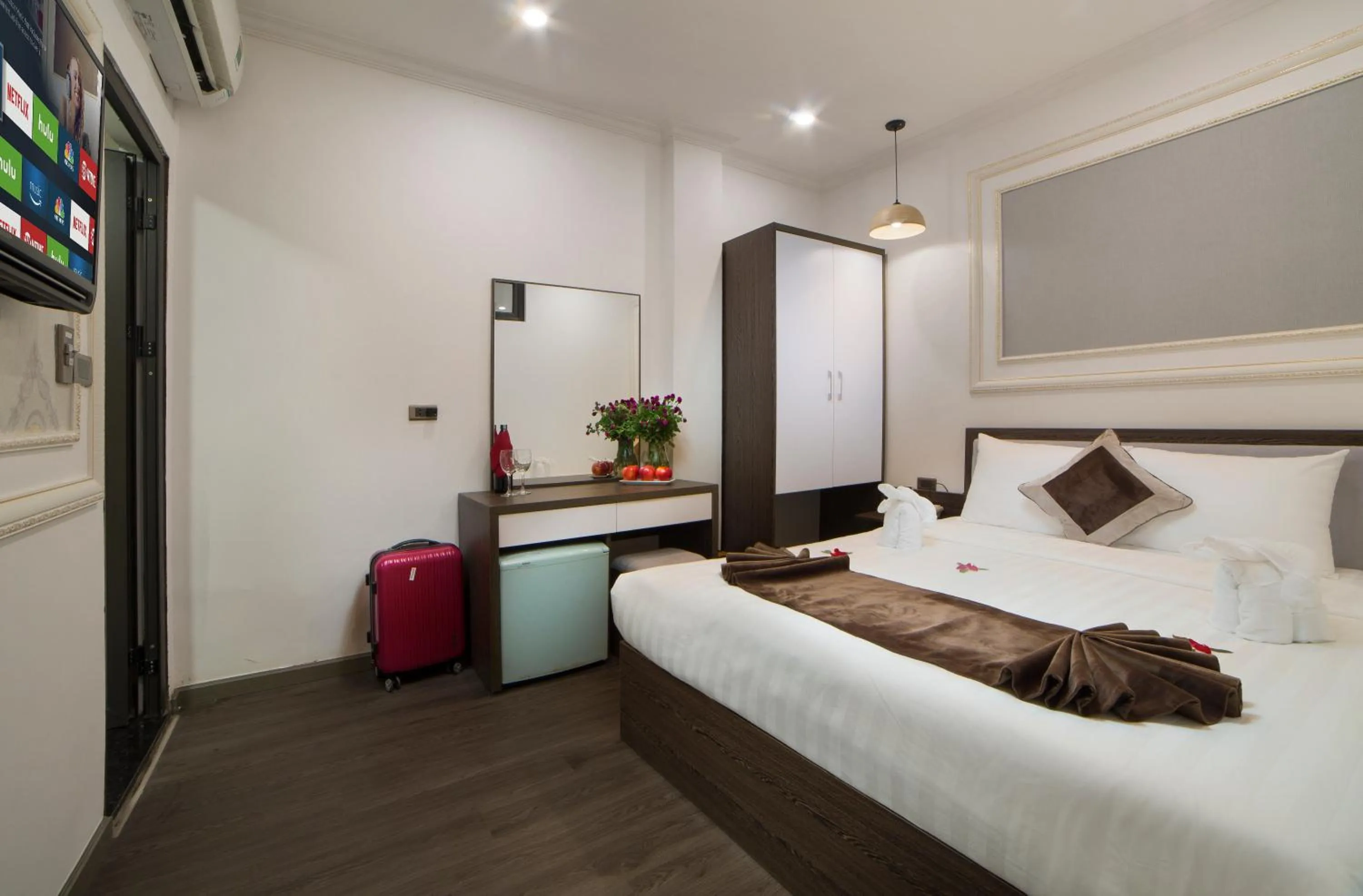 Bed in Galliot Central Hotel