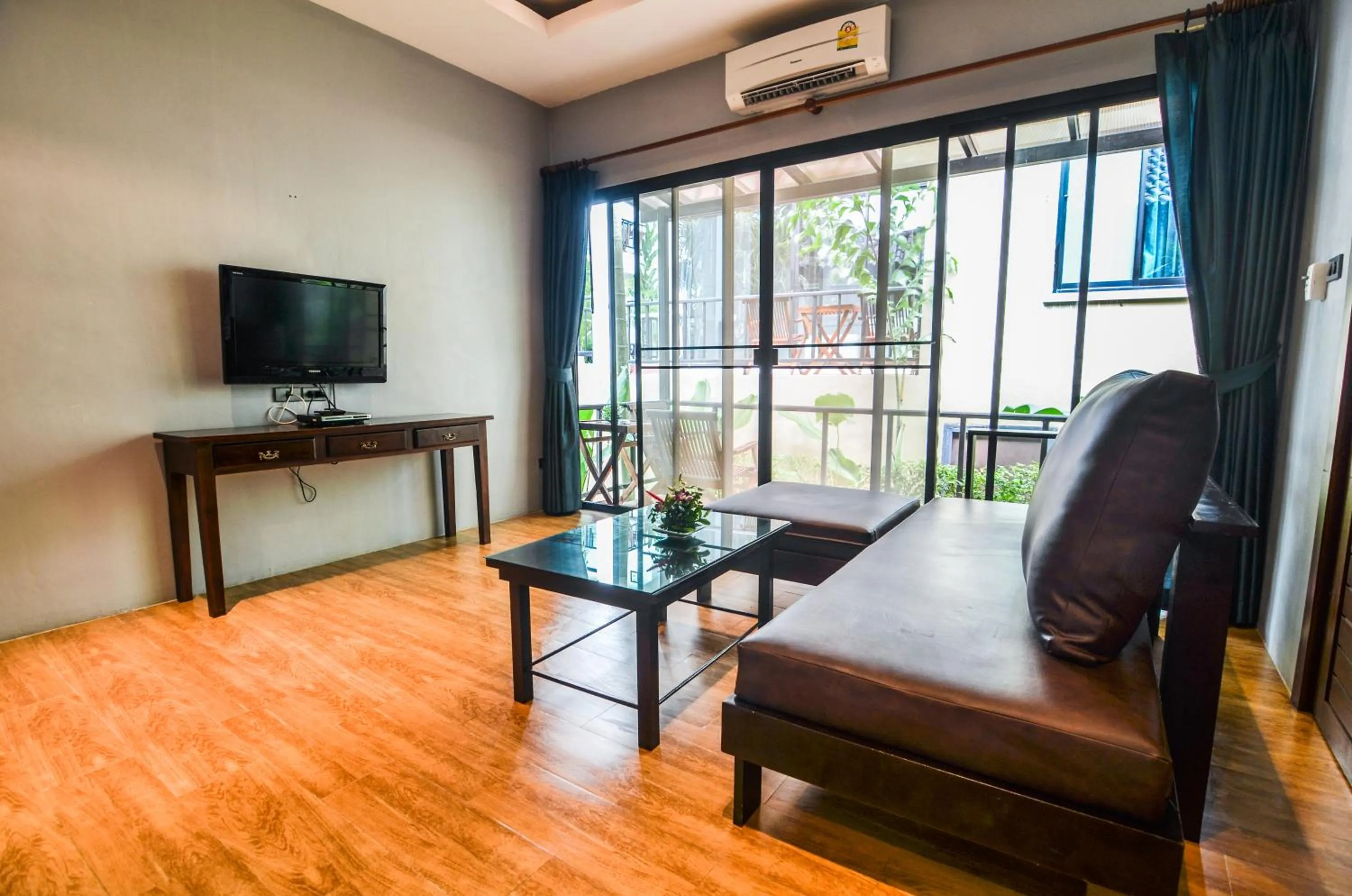 Living room in Cocoville Phuket - SHA Plus