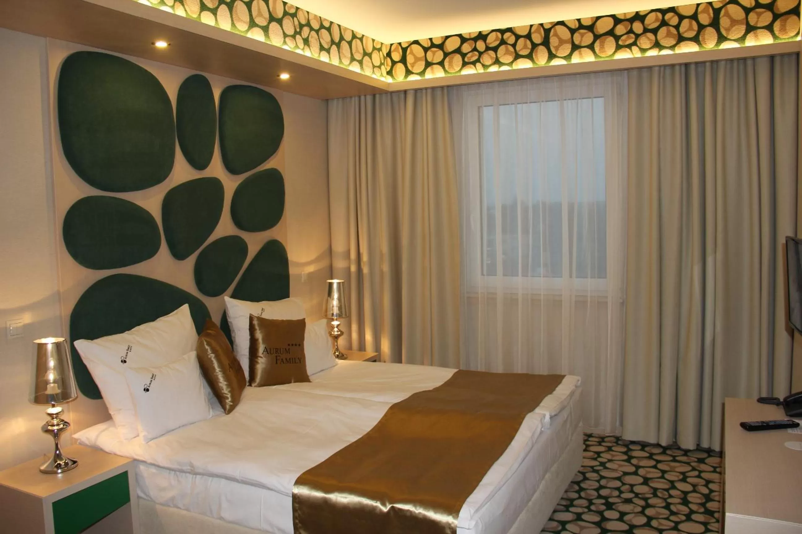 Bed in Hotel Aurum Family "A"