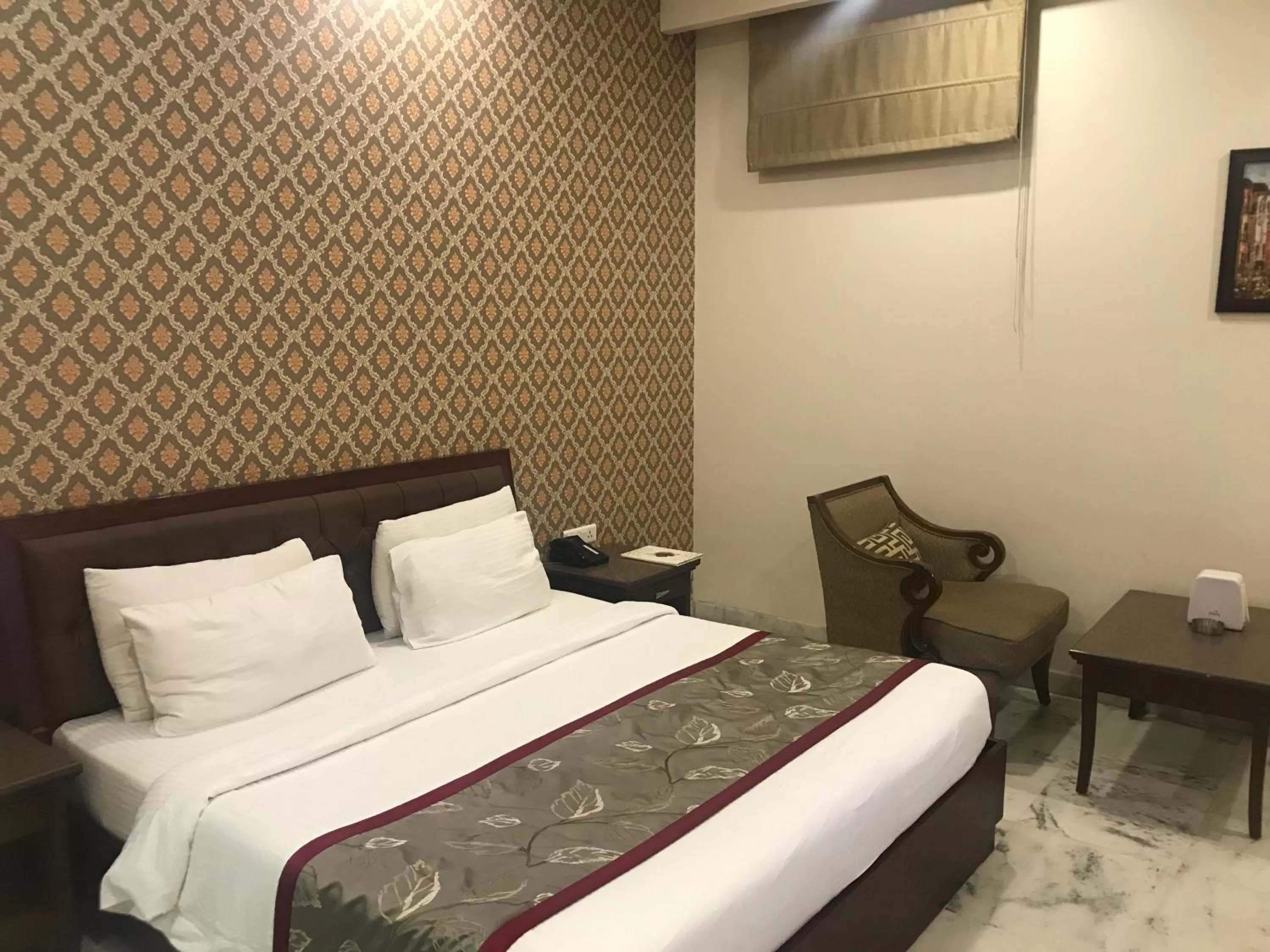 Photo of the whole room, Bed in Hotel Leela Grande