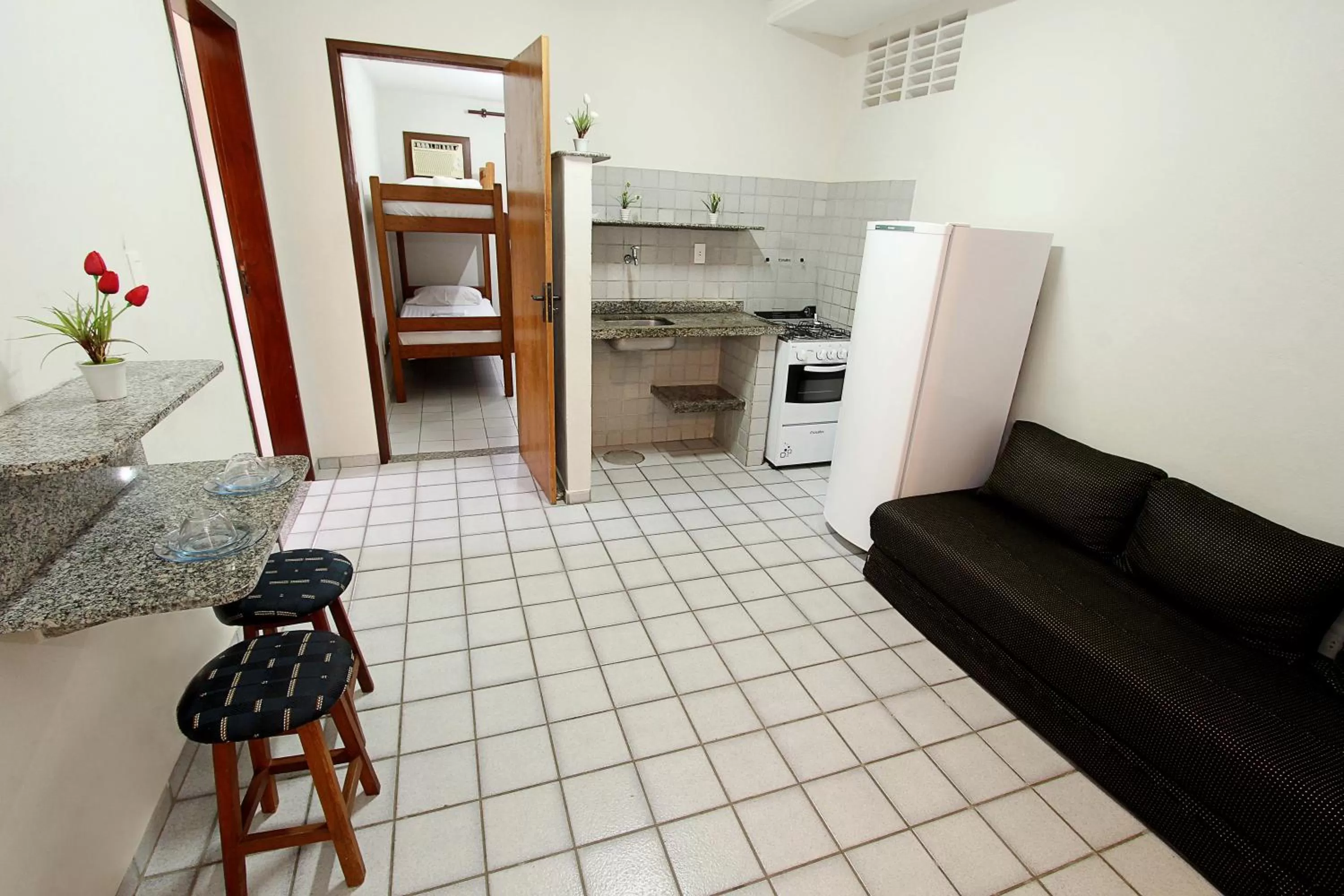 Kitchen or kitchenette in Praia Apart Hotel