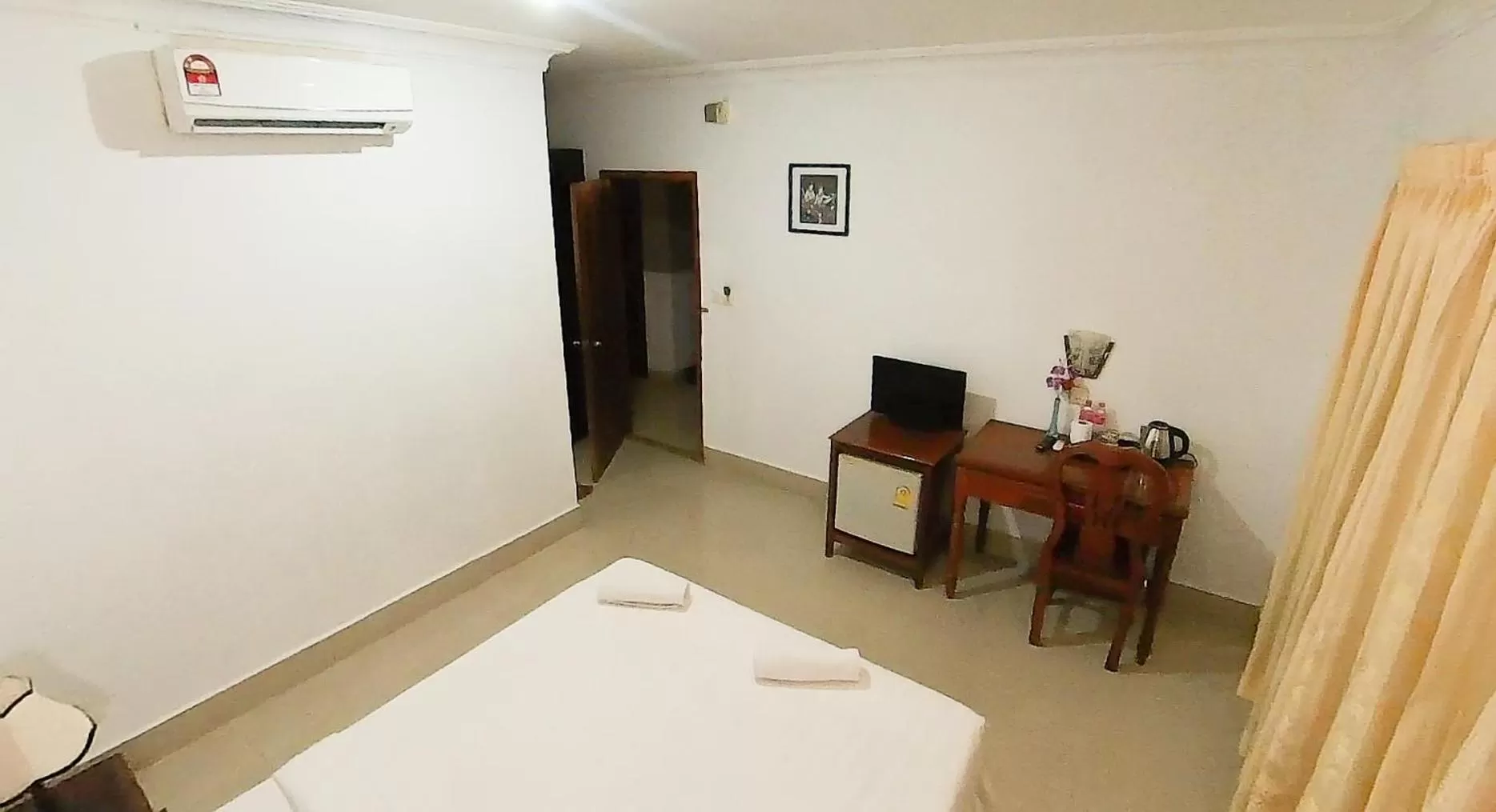 Bed in Riverside Hotel Phnom Penh