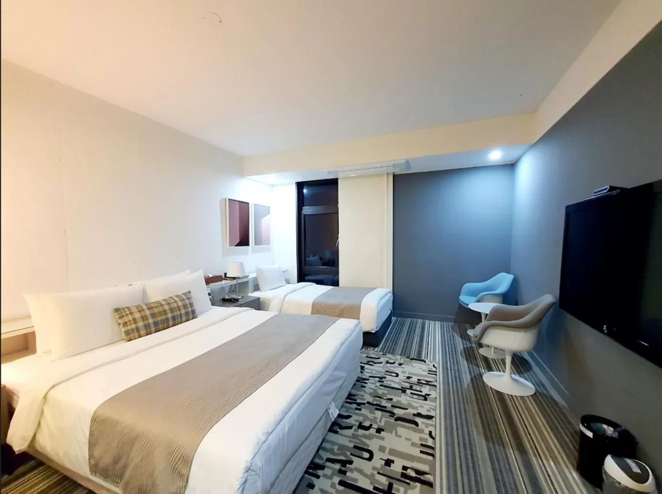 Bed in JS Boutique Hotel