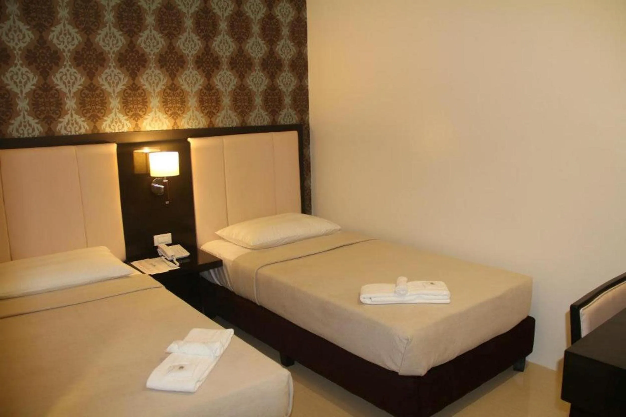 Photo of the whole room in Manhattan Suites Inn