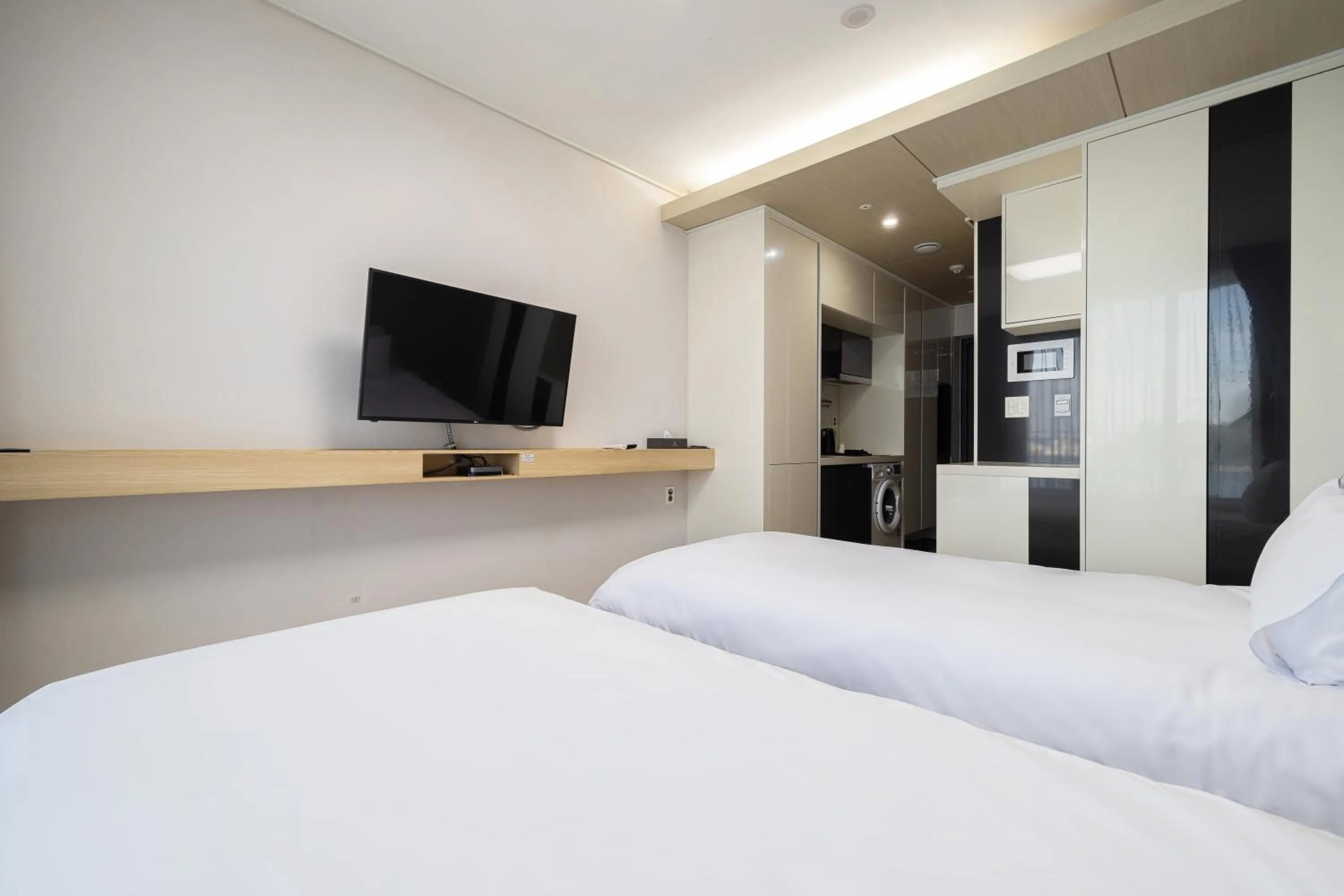 Bed in Ocean Soleview Hotel