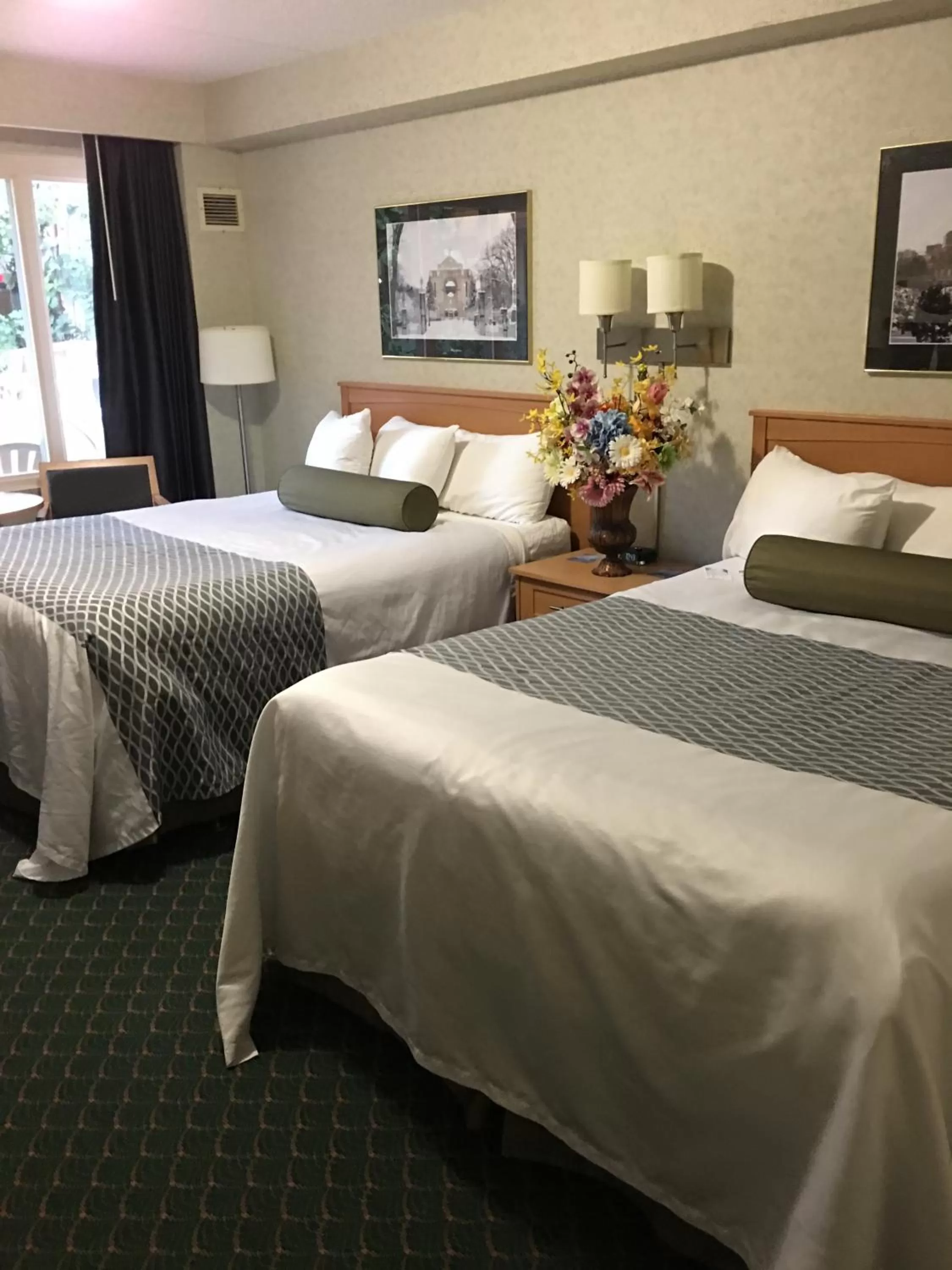 Pool view, Bed in Travelodge by Wyndham Winnipeg East