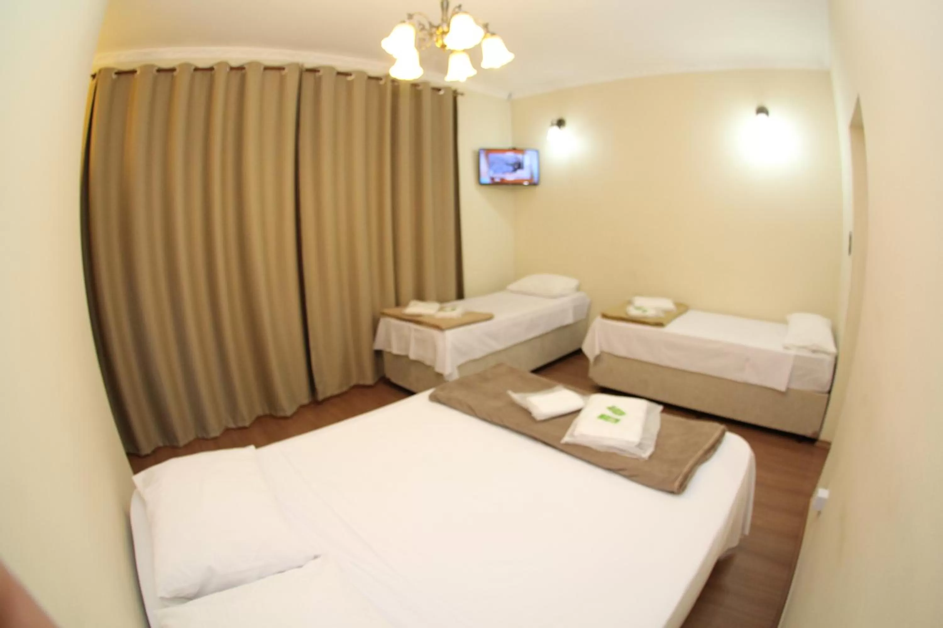 Bed in Pousada Santa Genebra