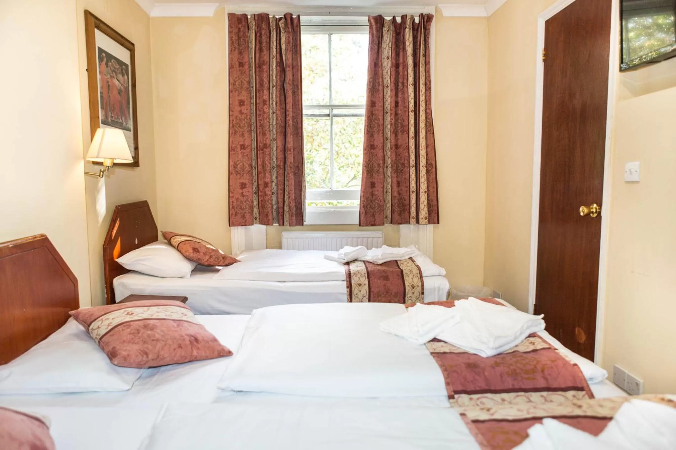 Bed in Dolphin Hotel