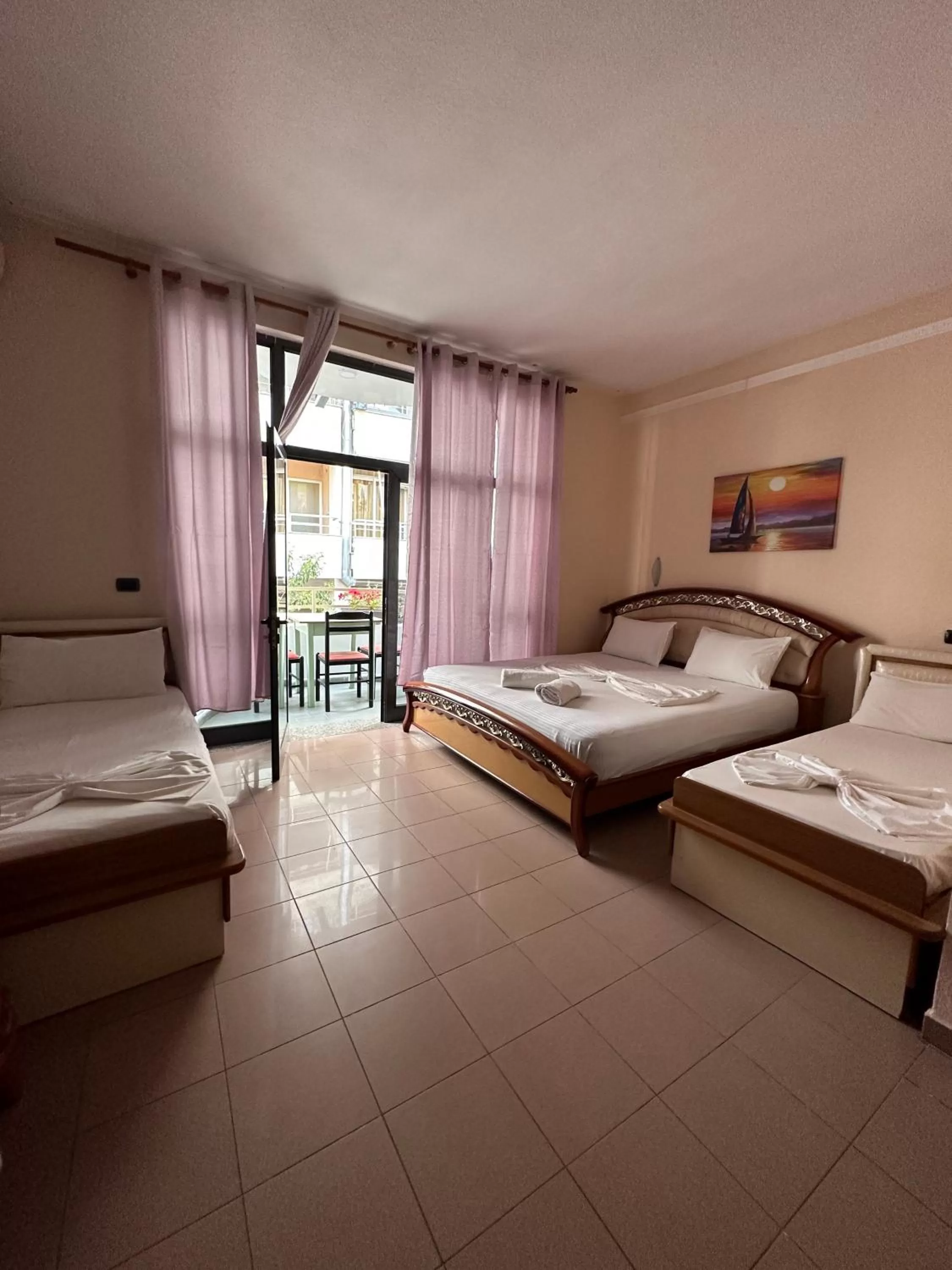 Photo of the whole room, Bed in Seashell Beach Rooms