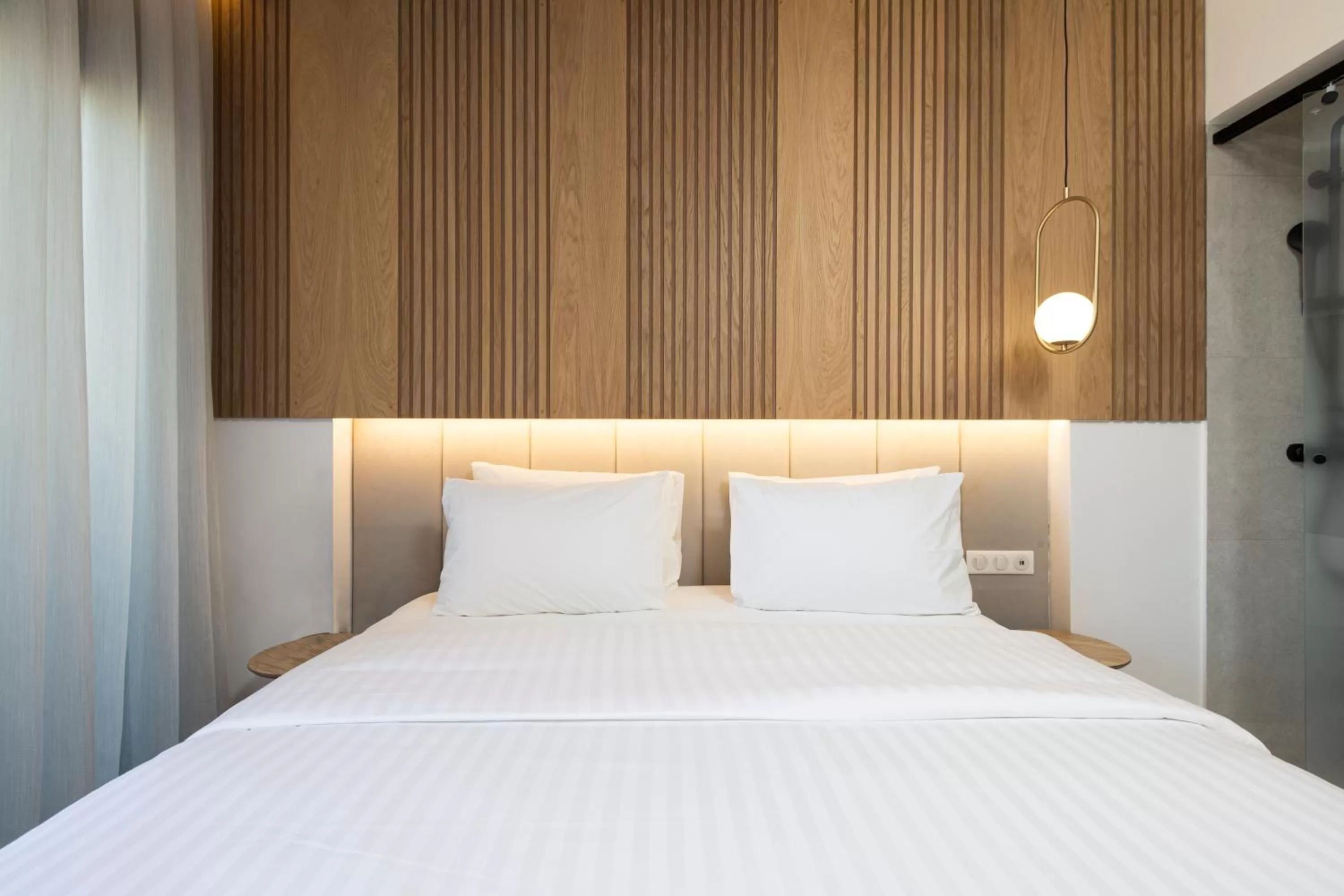 Bed in Incanto Boutique Suites - Neos Kosmos