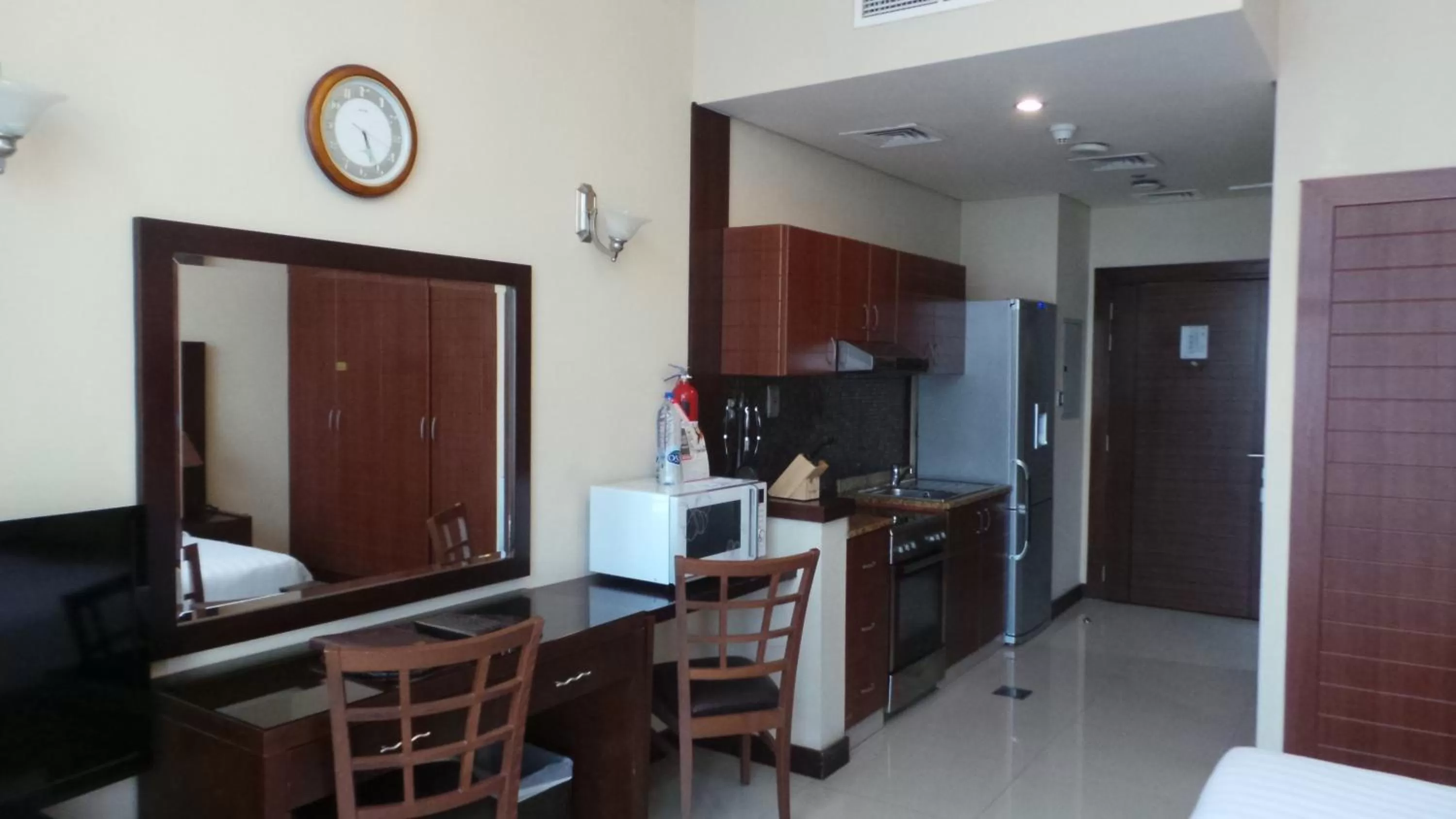Kitchen or kitchenette in Xclusive Maples Hotel Apartment