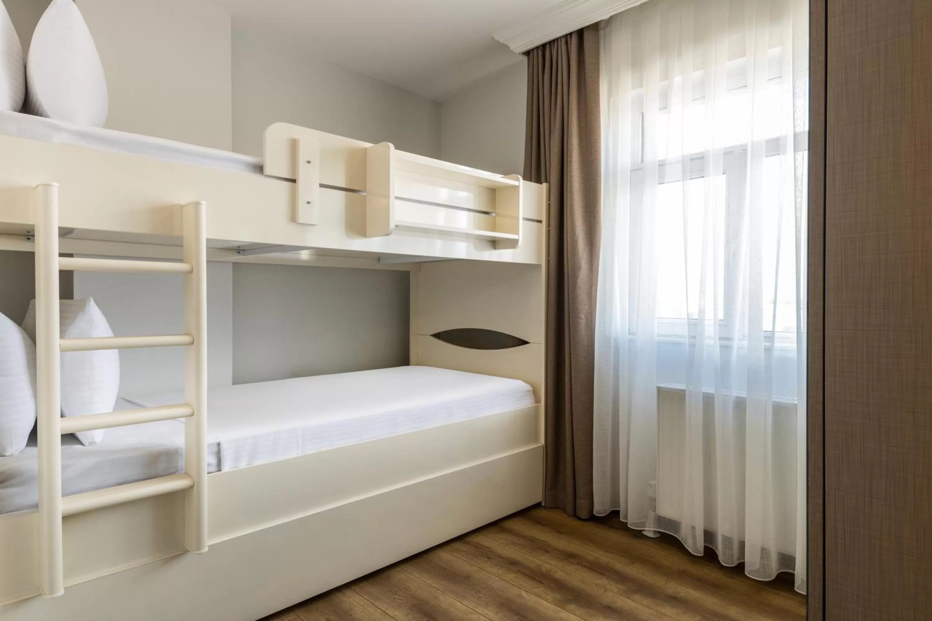 Bed in BayMari Suites City Life