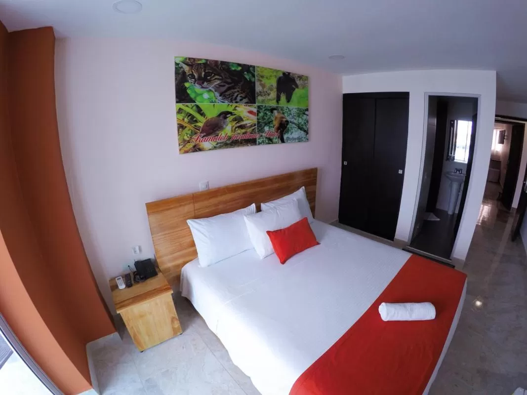 Bed in Kamaleb Farallones Hotel