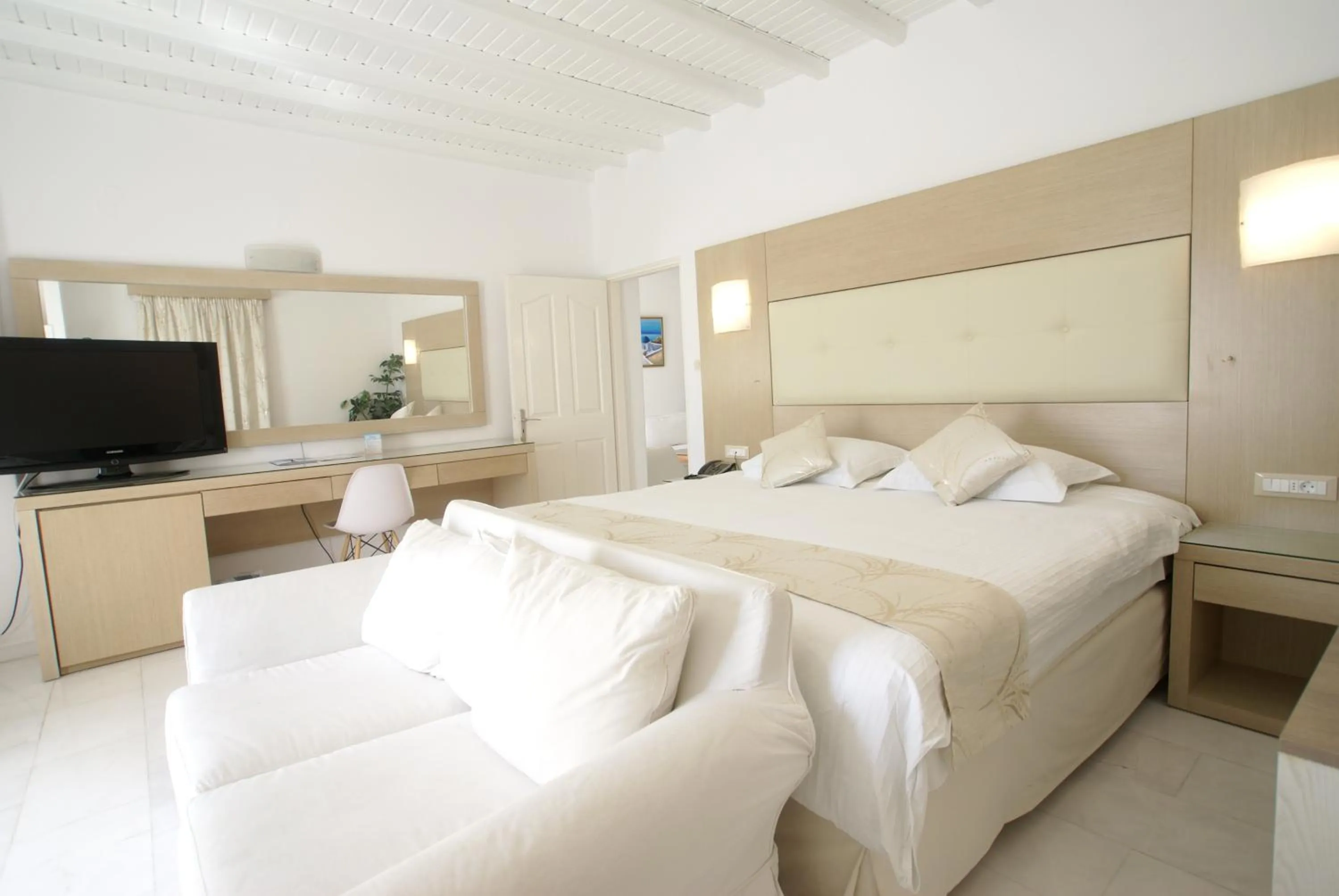 Bed in Dionysos Luxury Hotel Mykonos