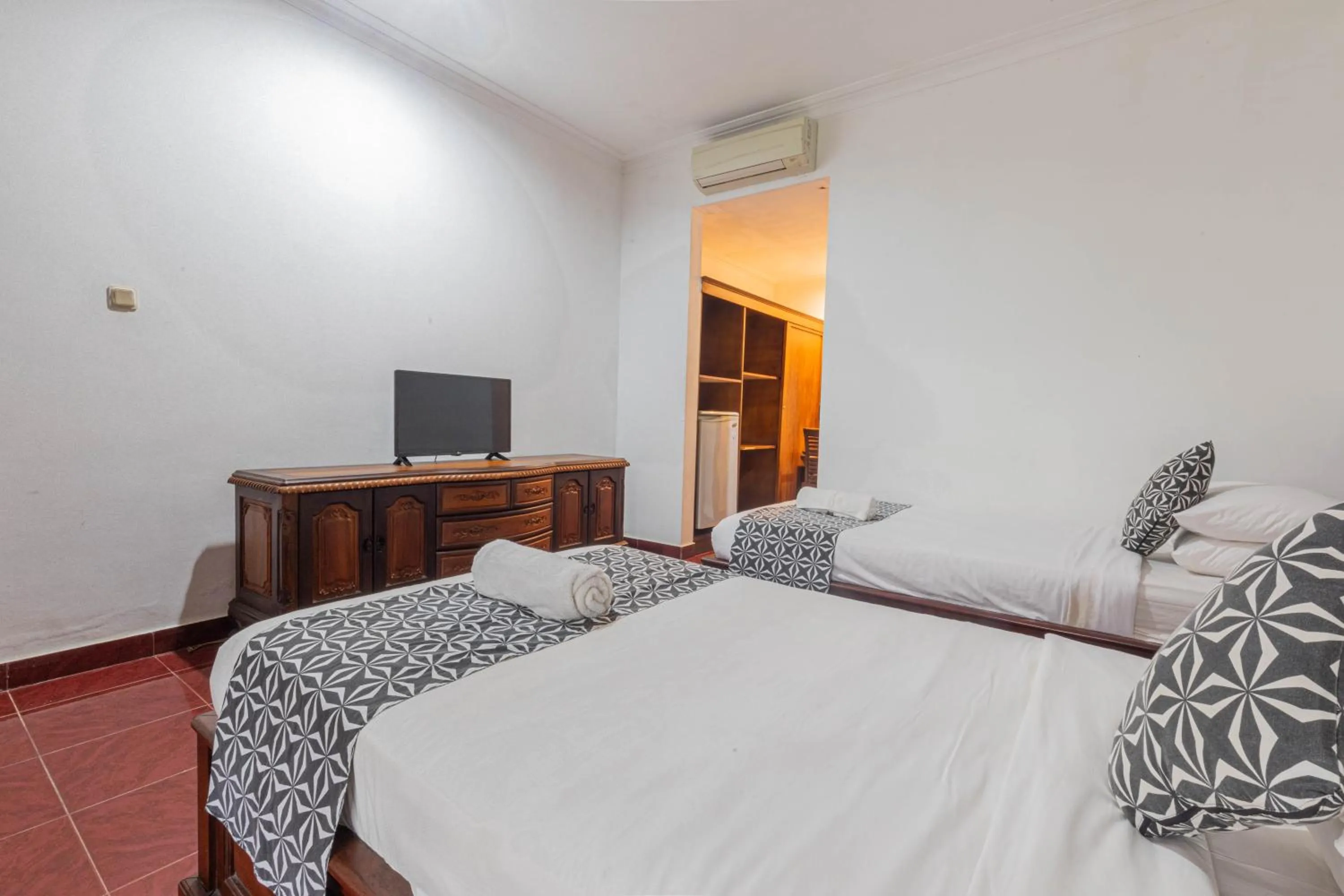 Bedroom in Puri Mango Guest House Sanur