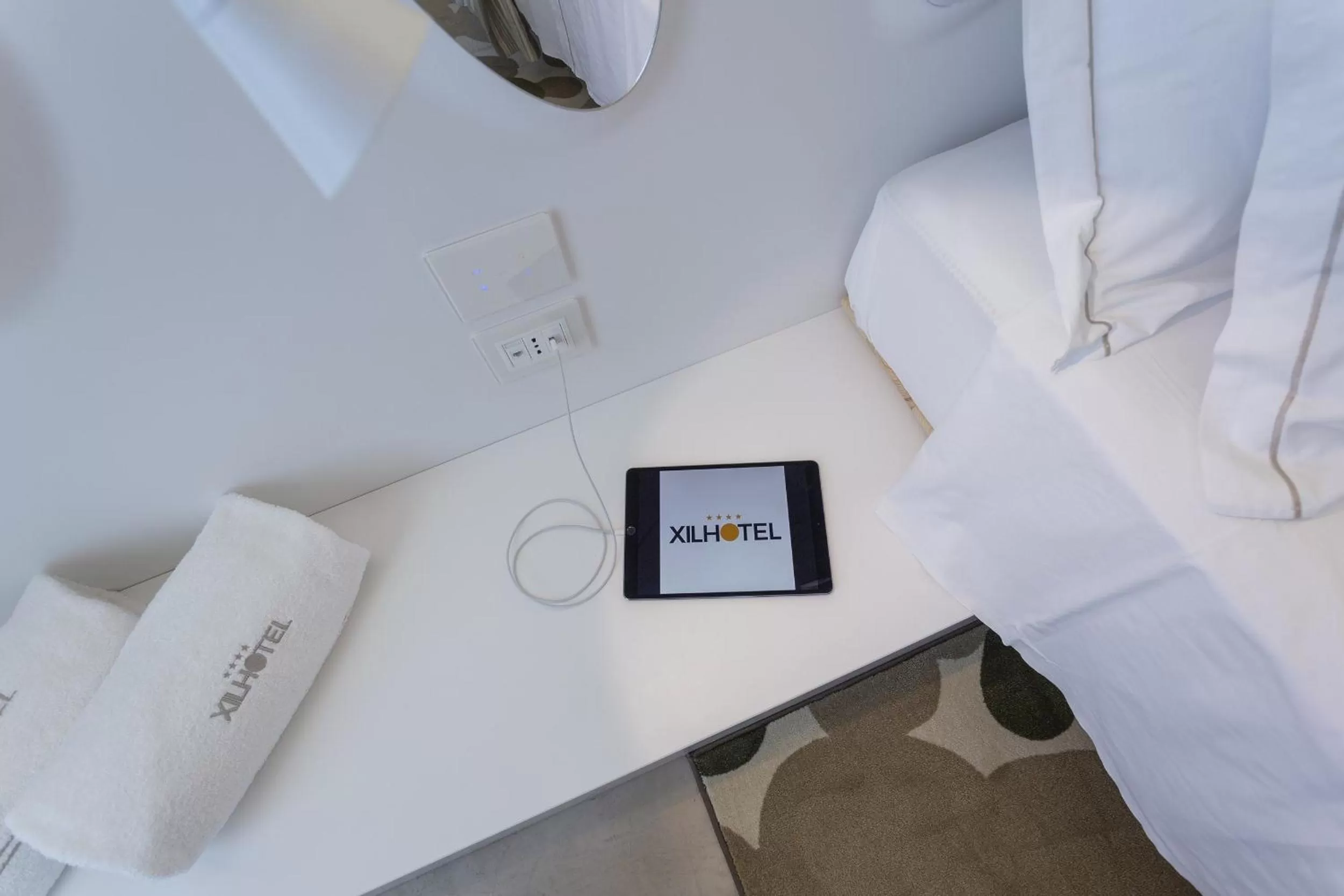 Property logo or sign in Xilhotel