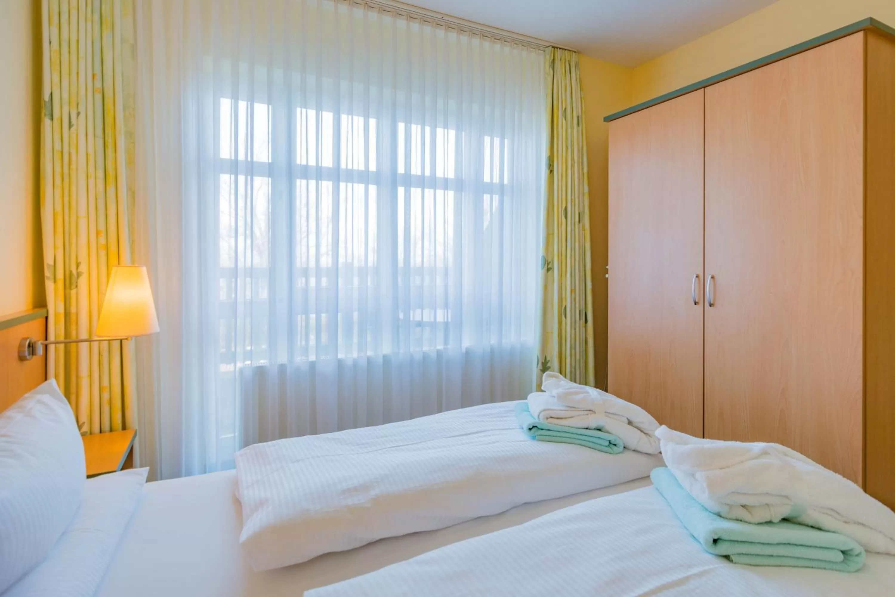 Photo of the whole room, Bed in Am Weststrand Aparthotel Kühlungsborn