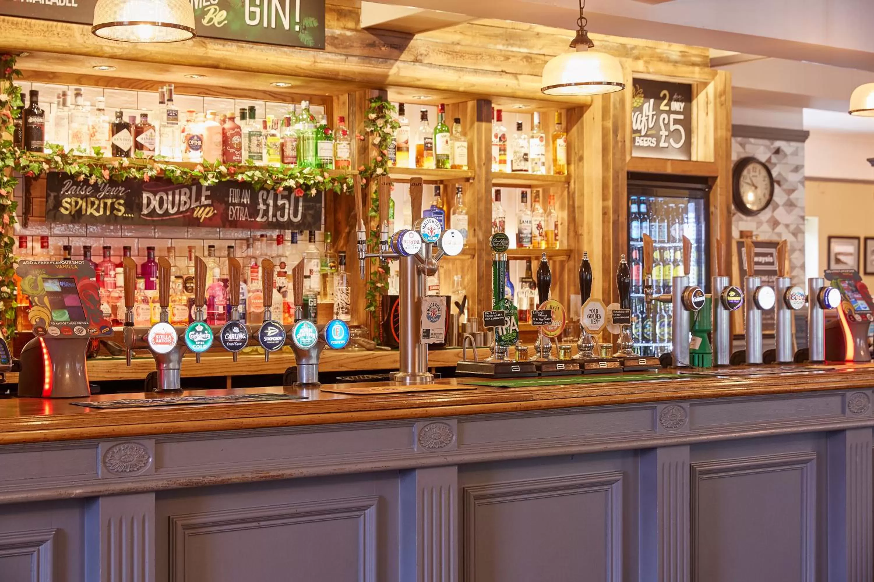 Lounge or bar in Corner House Inn by Greene King Inns