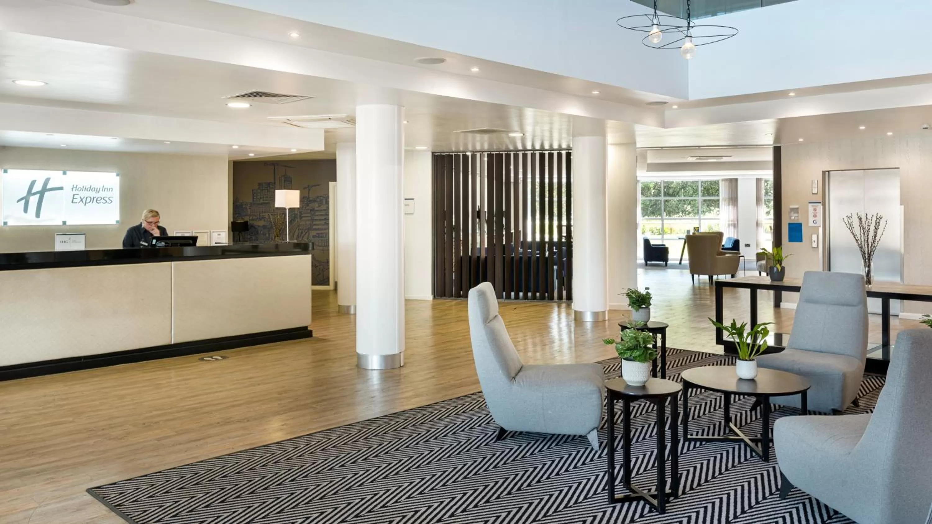 Lobby or reception in Holiday Inn Express Leigh - Sports Village by IHG
