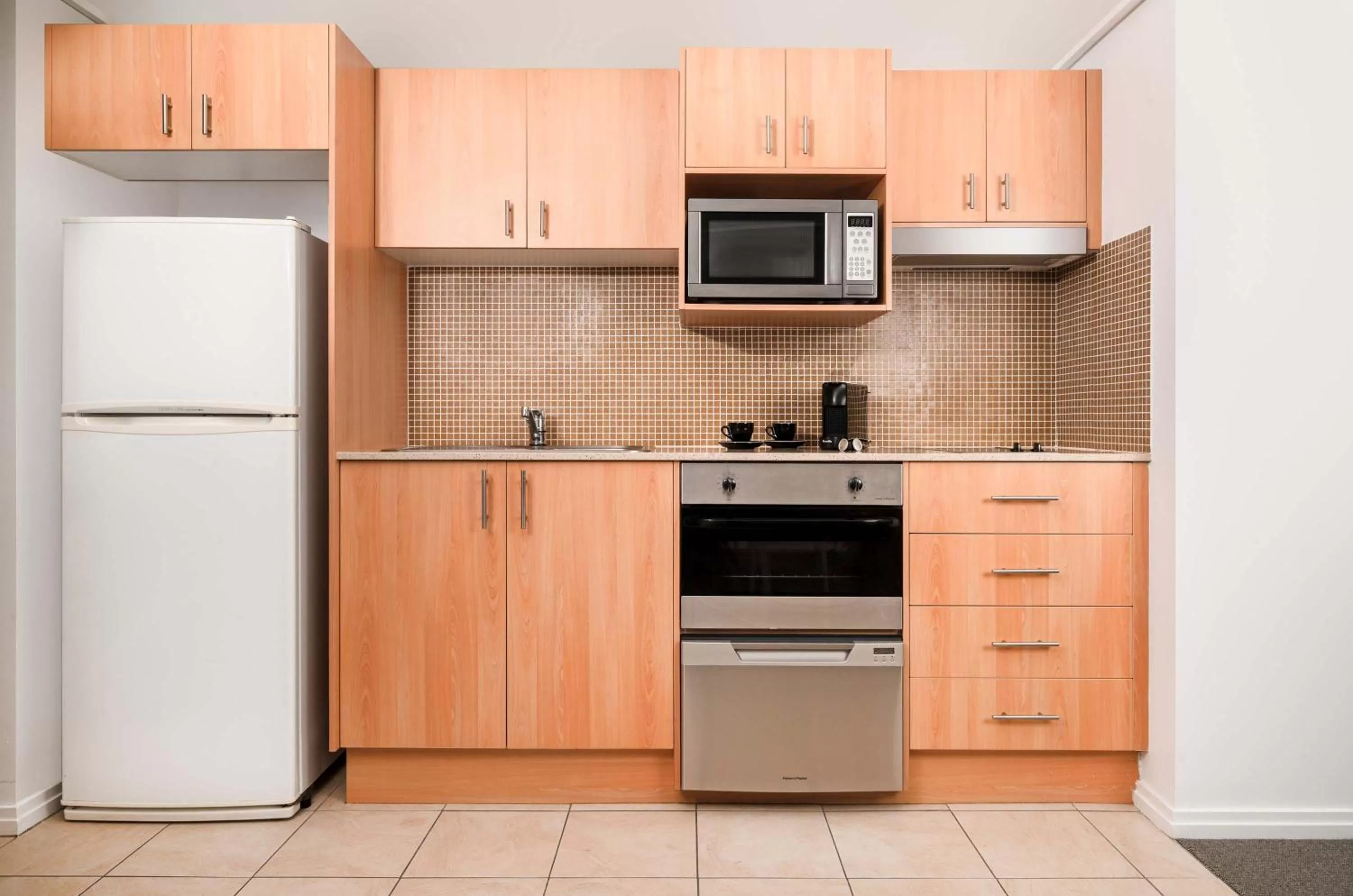 kitchen in Mantra The Observatory