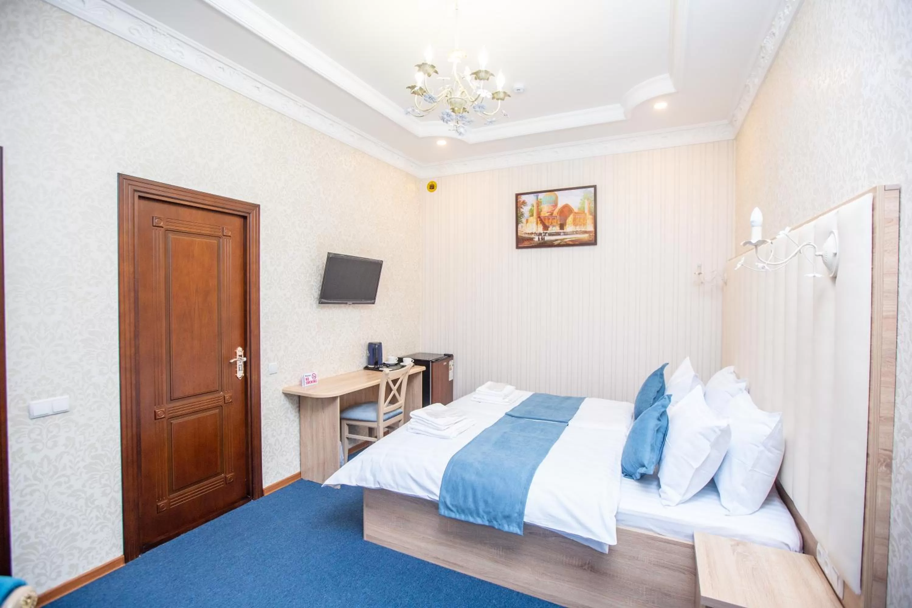 Bed in Mirzo Boutique Hotel