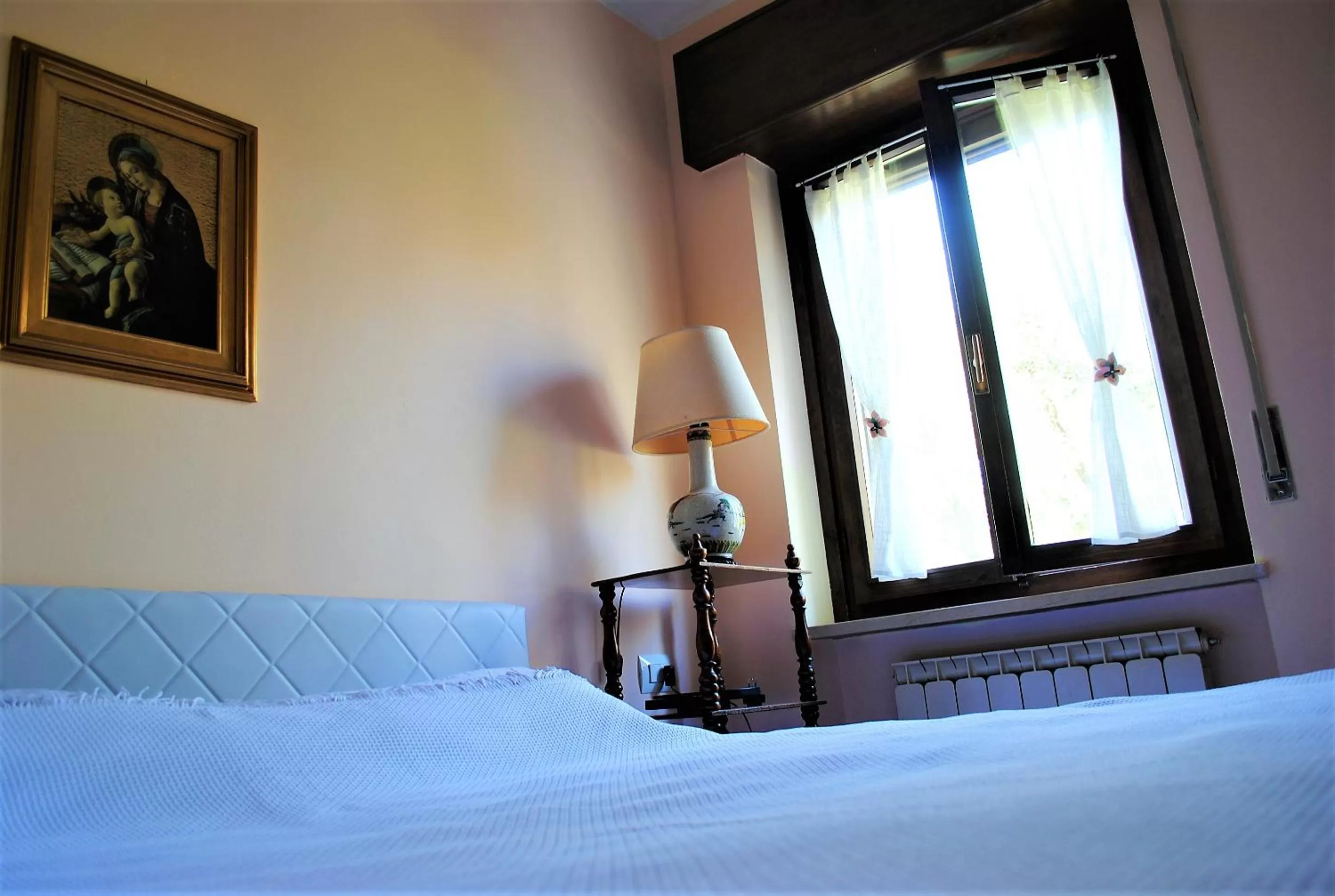 Bed in AGRITURISMO MELOGRANO D'ORO