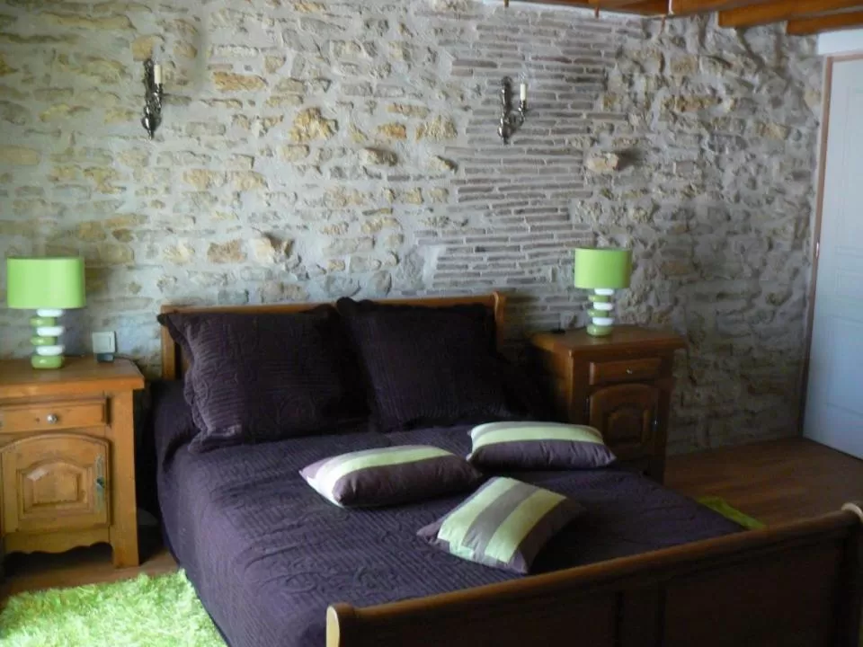 Bed in Le Manoir des Chapelles