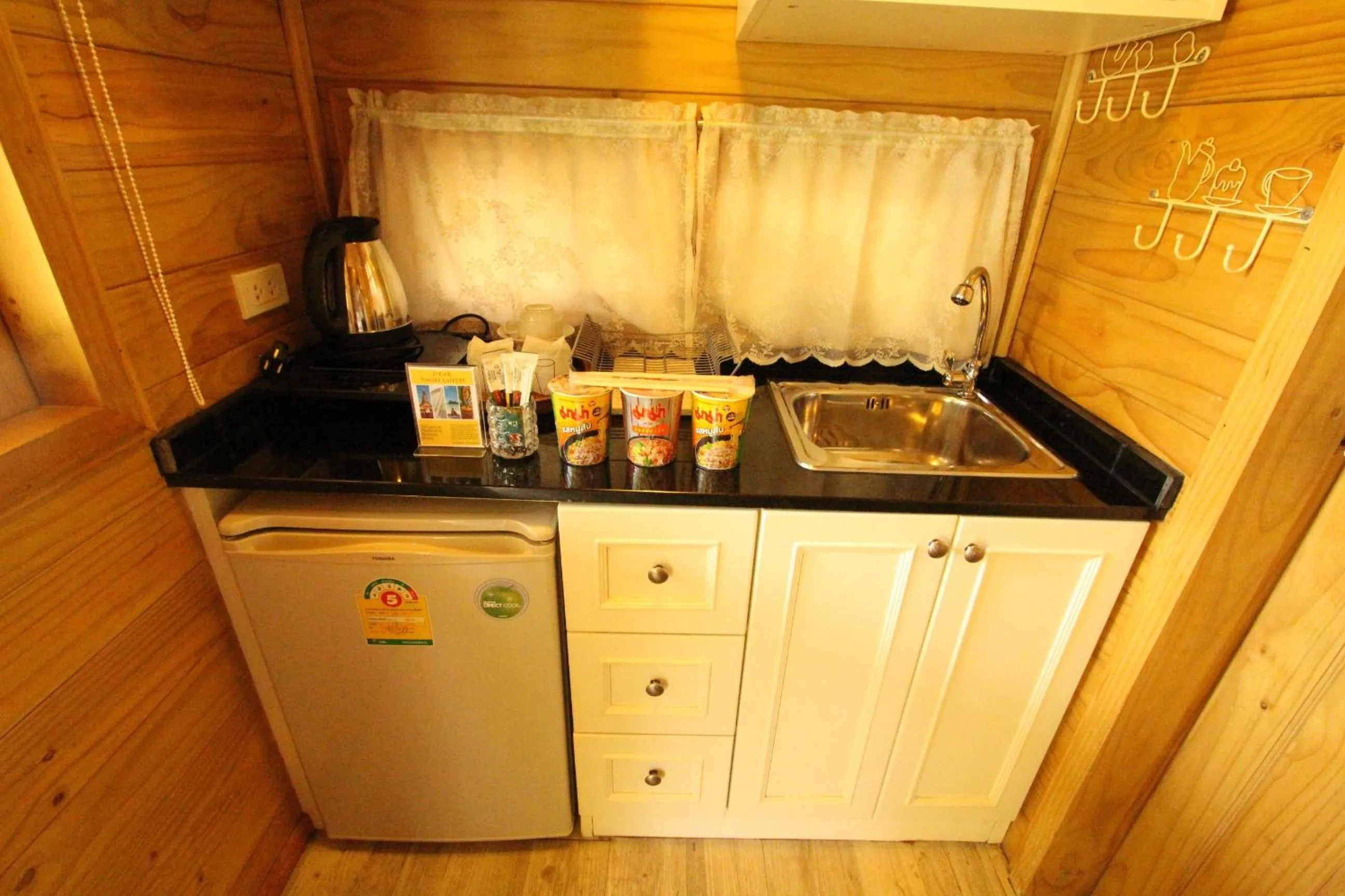 Kitchen or kitchenette in At Residence Suvarnabhumi Hotel