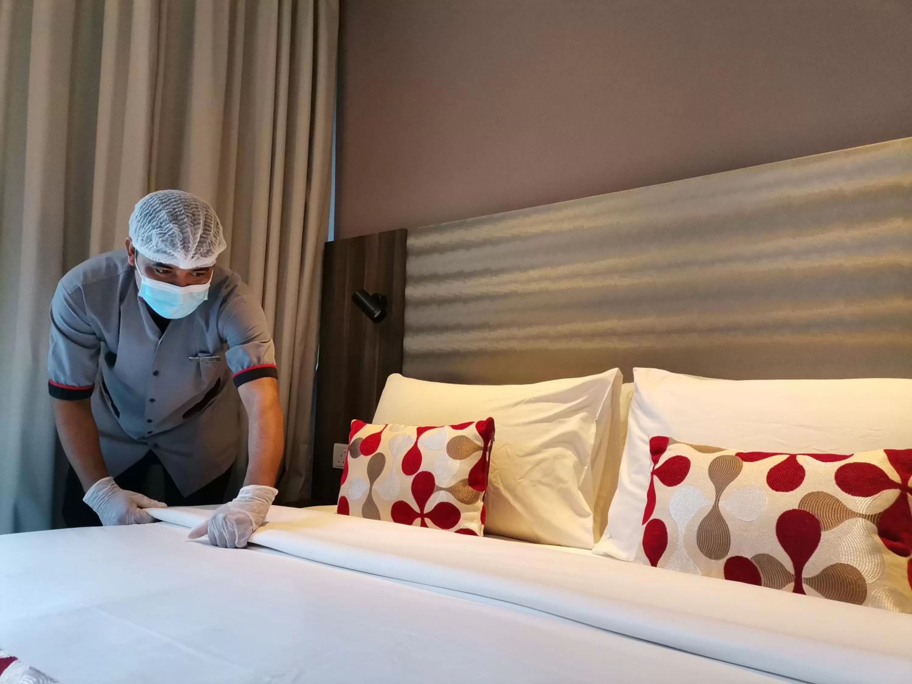 Staff, Bed in Ramada Suites by Wyndham Kuala Lumpur City Centre