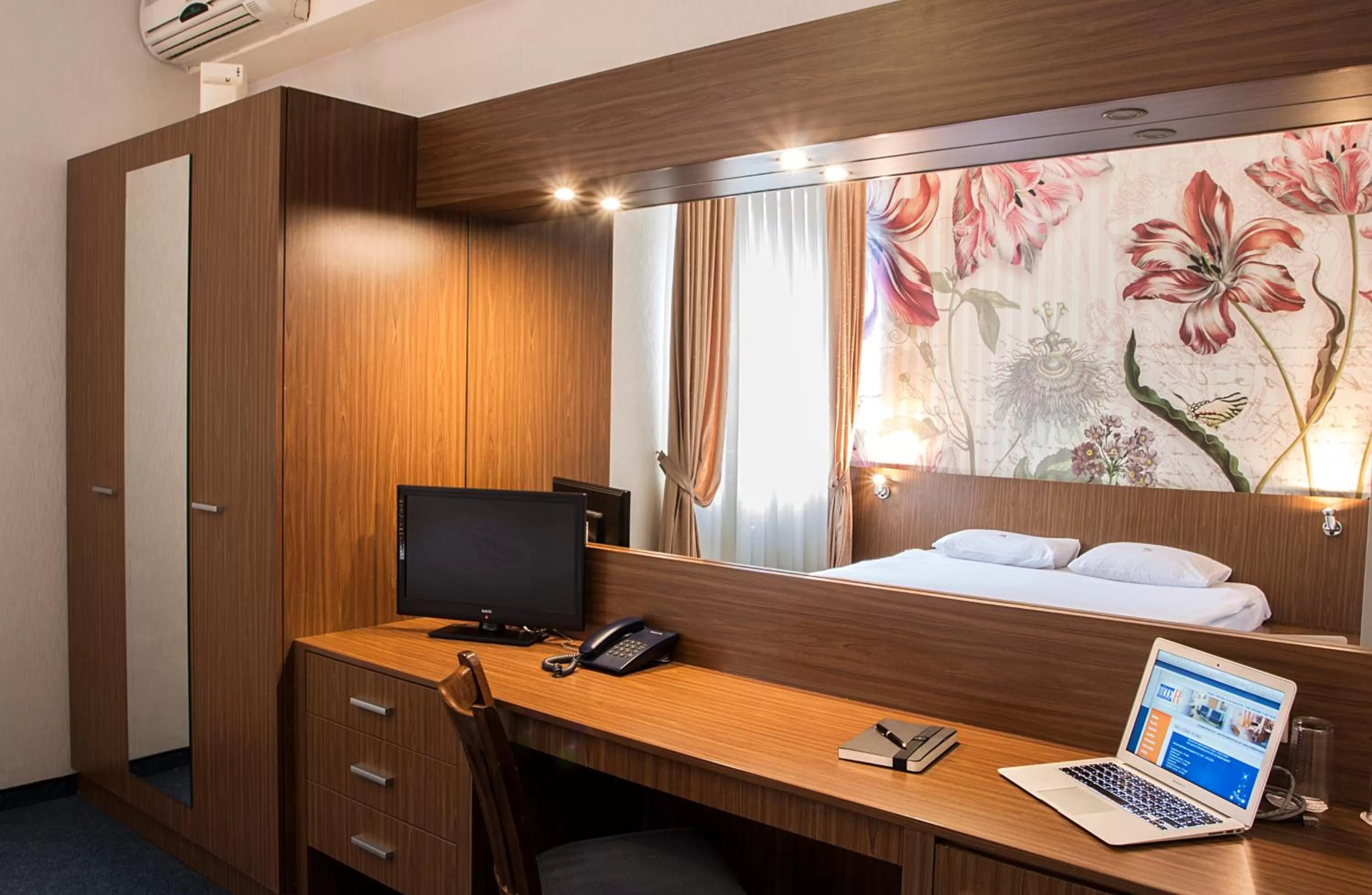 Bed in DITER Family Hotel