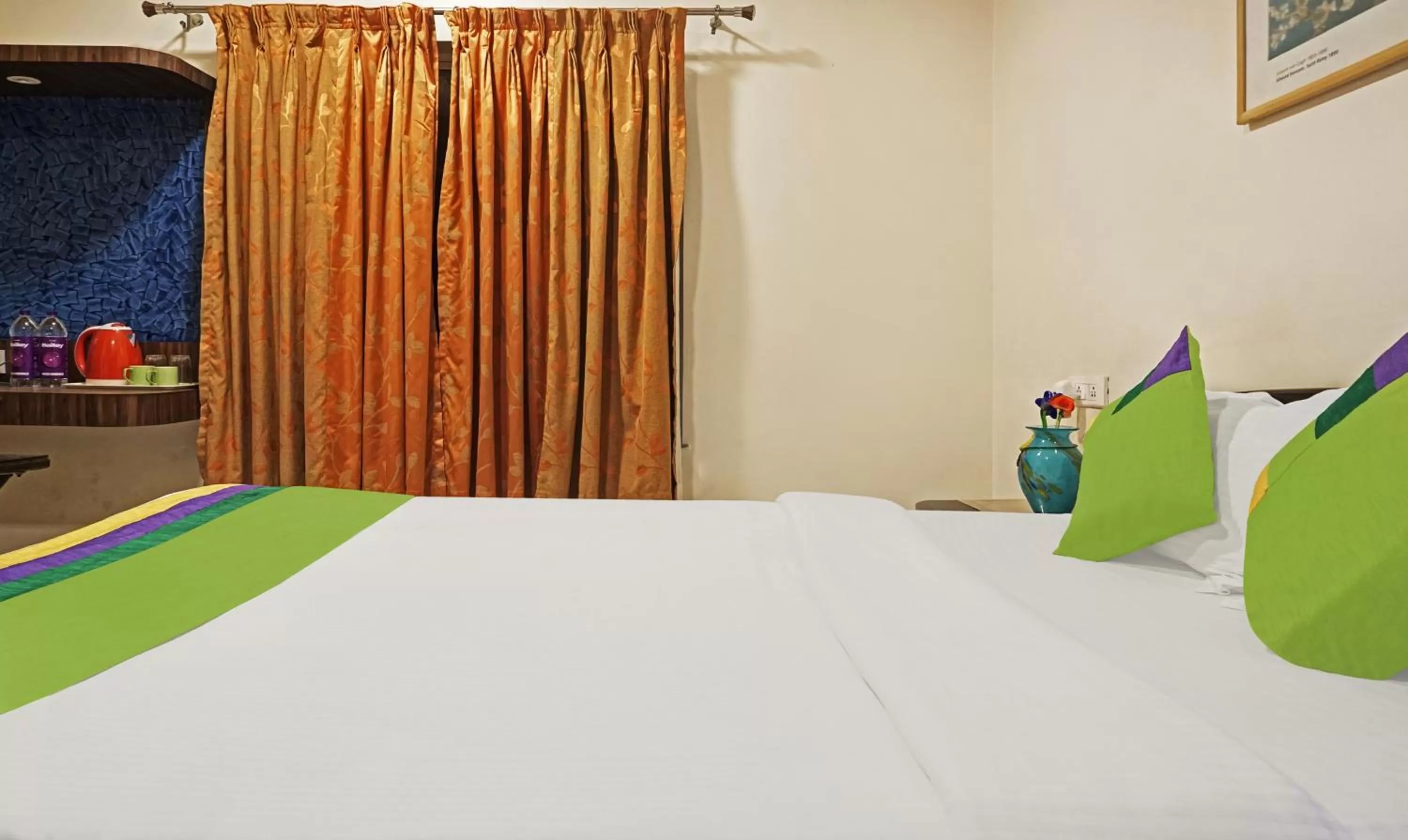 Bedroom, Bed in Treebo Excellent Home