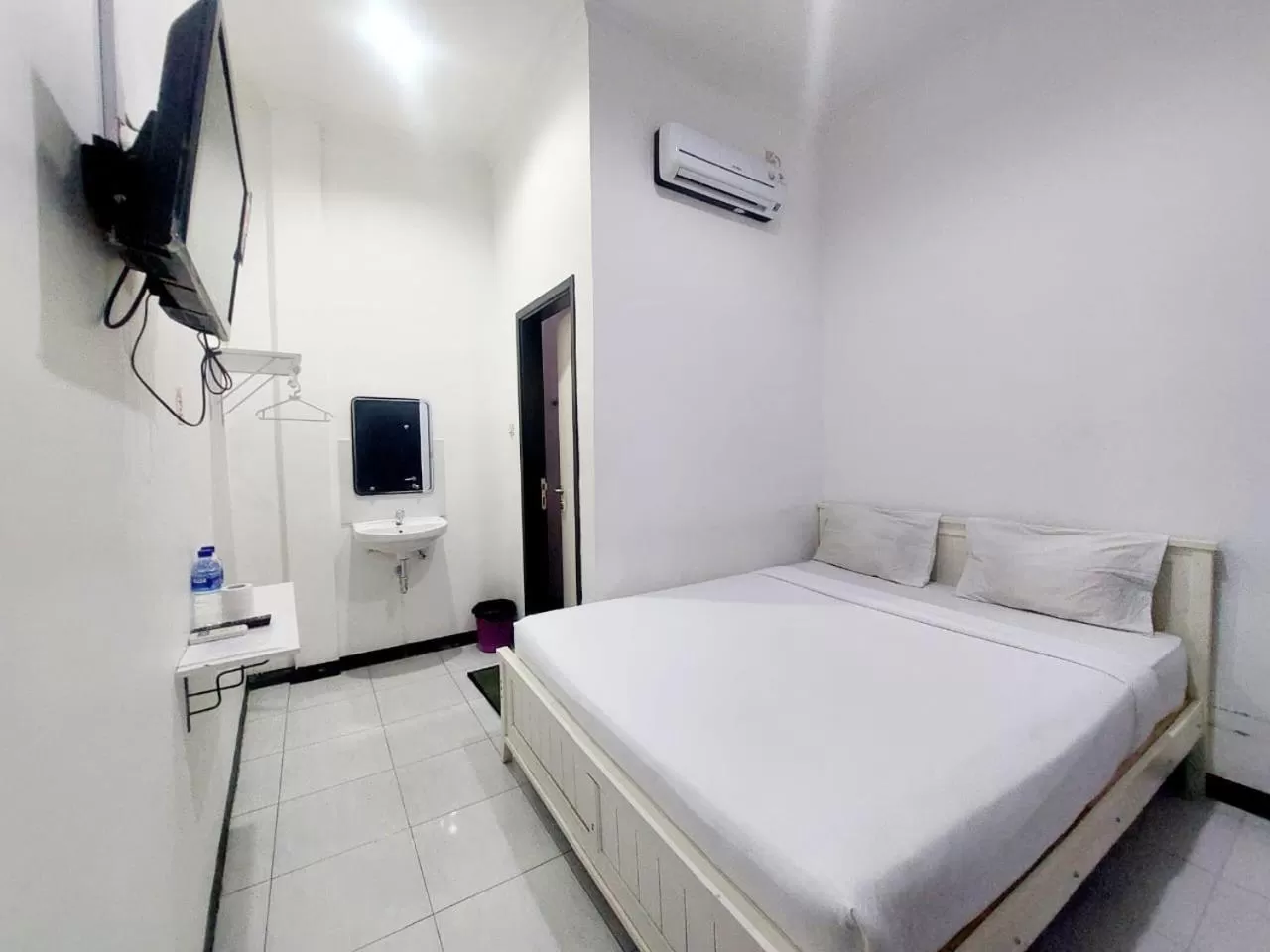 Bed in COZY STAY KUPANG