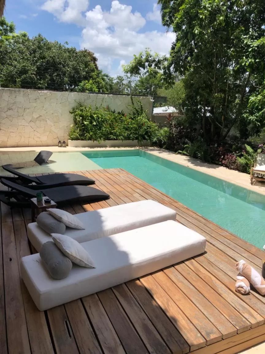 Swimming pool in AGAM Hotel Boutique Bacalar - Adults Only