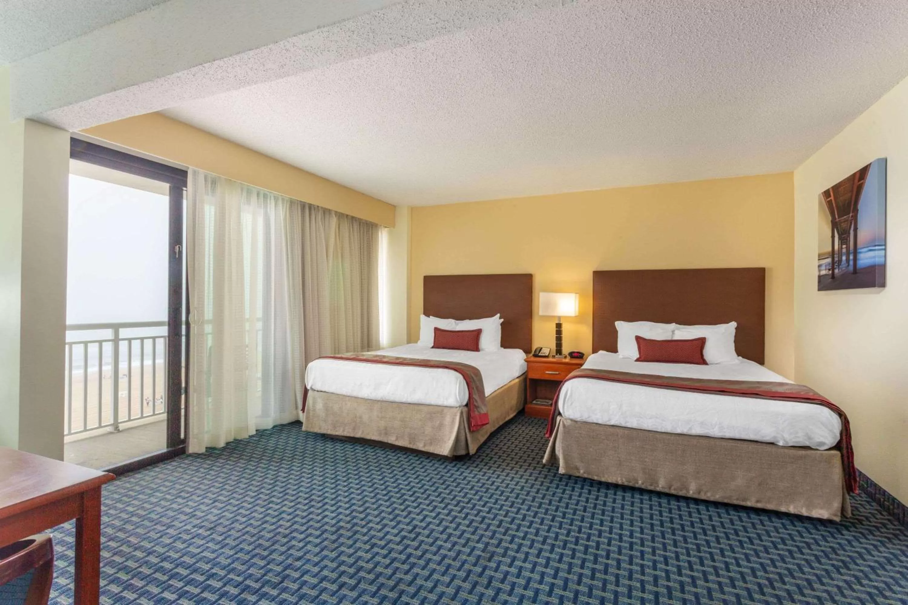 Photo of the whole room, Bed in Ramada Plaza by Wyndham Virginia Beach Oceanfront