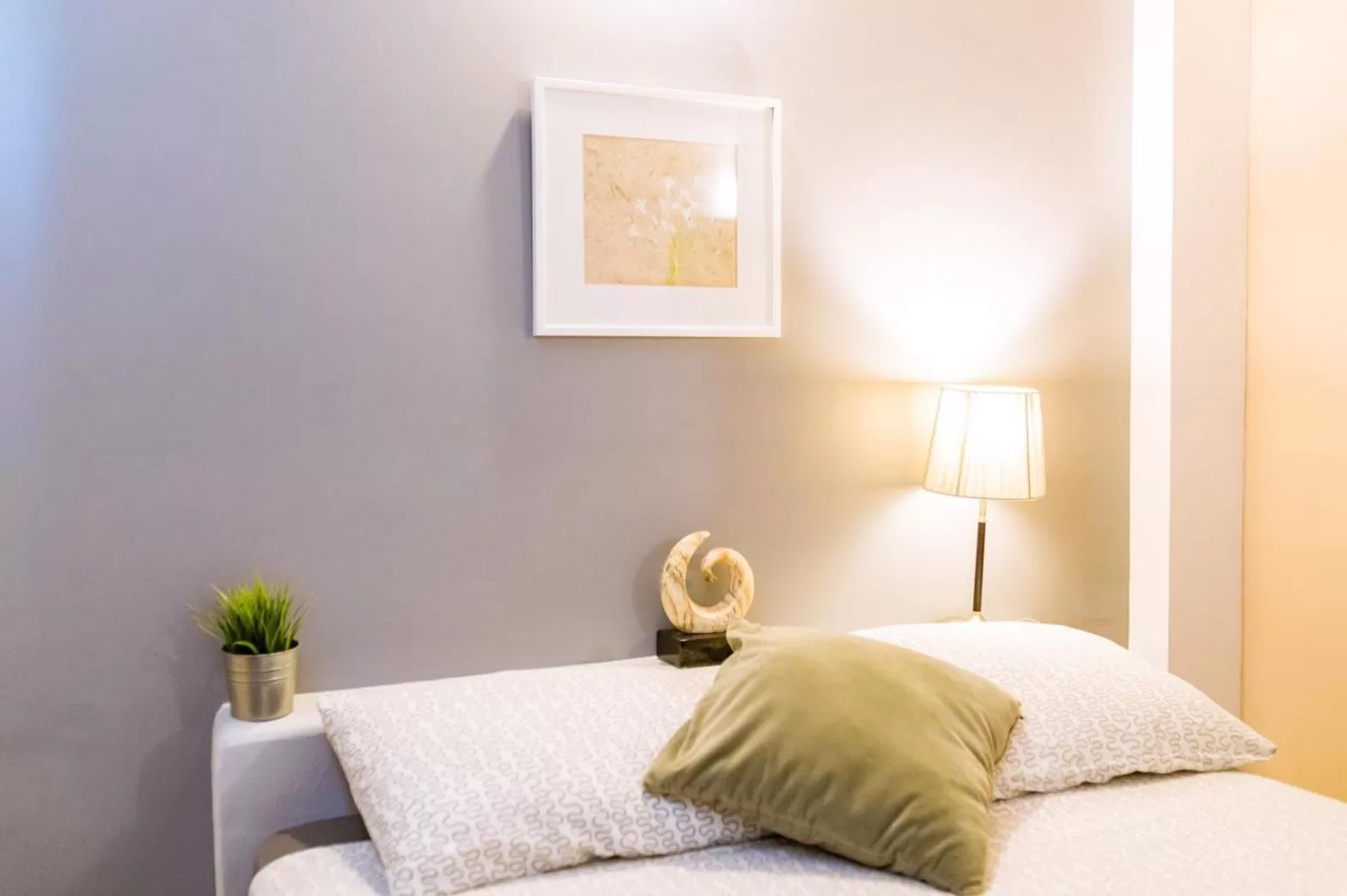 Bed in THE BEACH CHA AM Residence