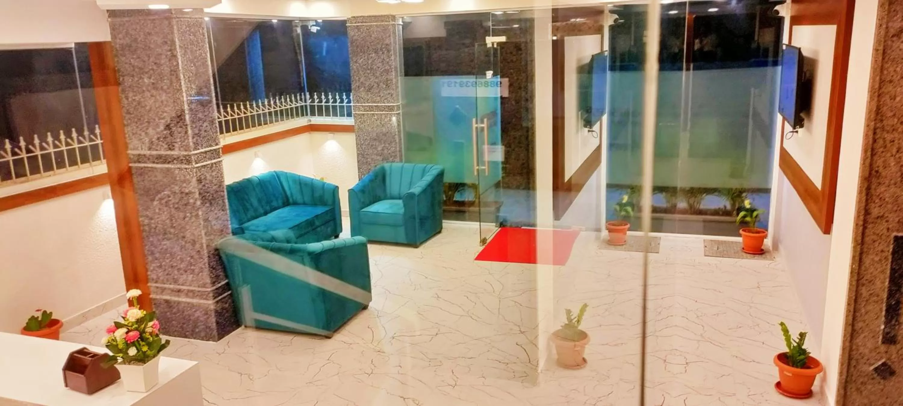 Seating area in Keerthis Royal Suites - Hotel Near Kempegowda International Airport