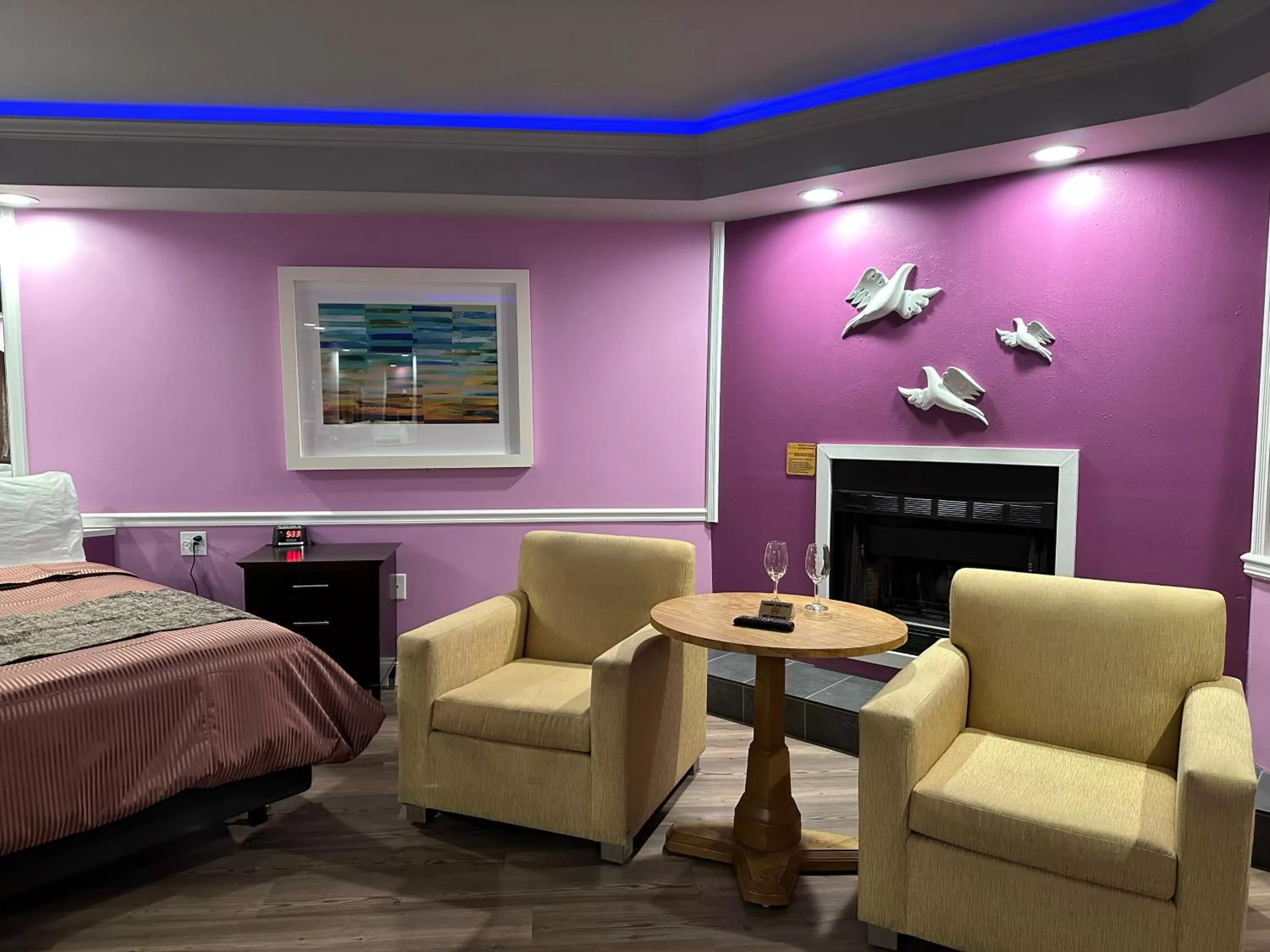 Seating area, Bed in Inn of the Dove - Romantic Luxury Suites with Jacuzzi & Seasonal Fireplace at Harrisburg-Hershey-Philadelphia, PA