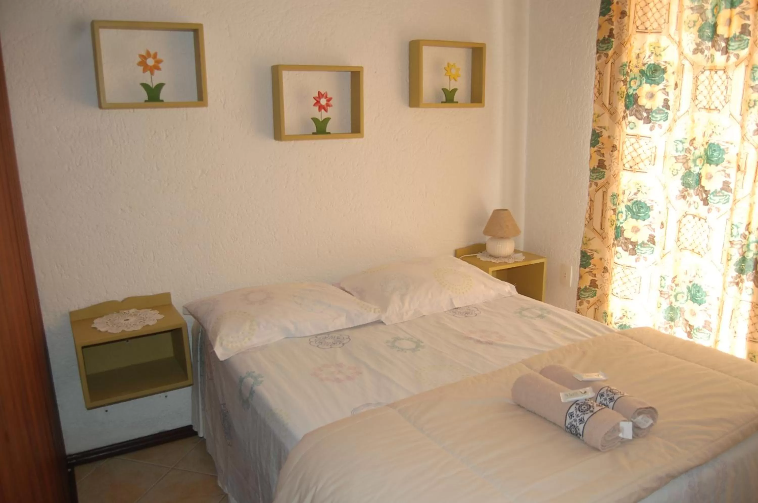 Bed in Pousada Santa Genoveva campeche