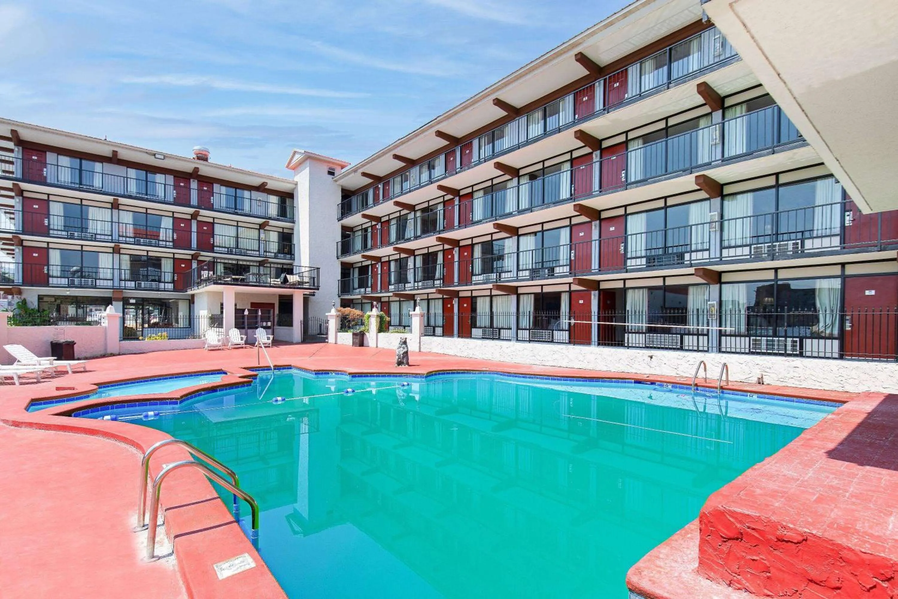Pool view in Americana Inn a Travelodge by Wyndham