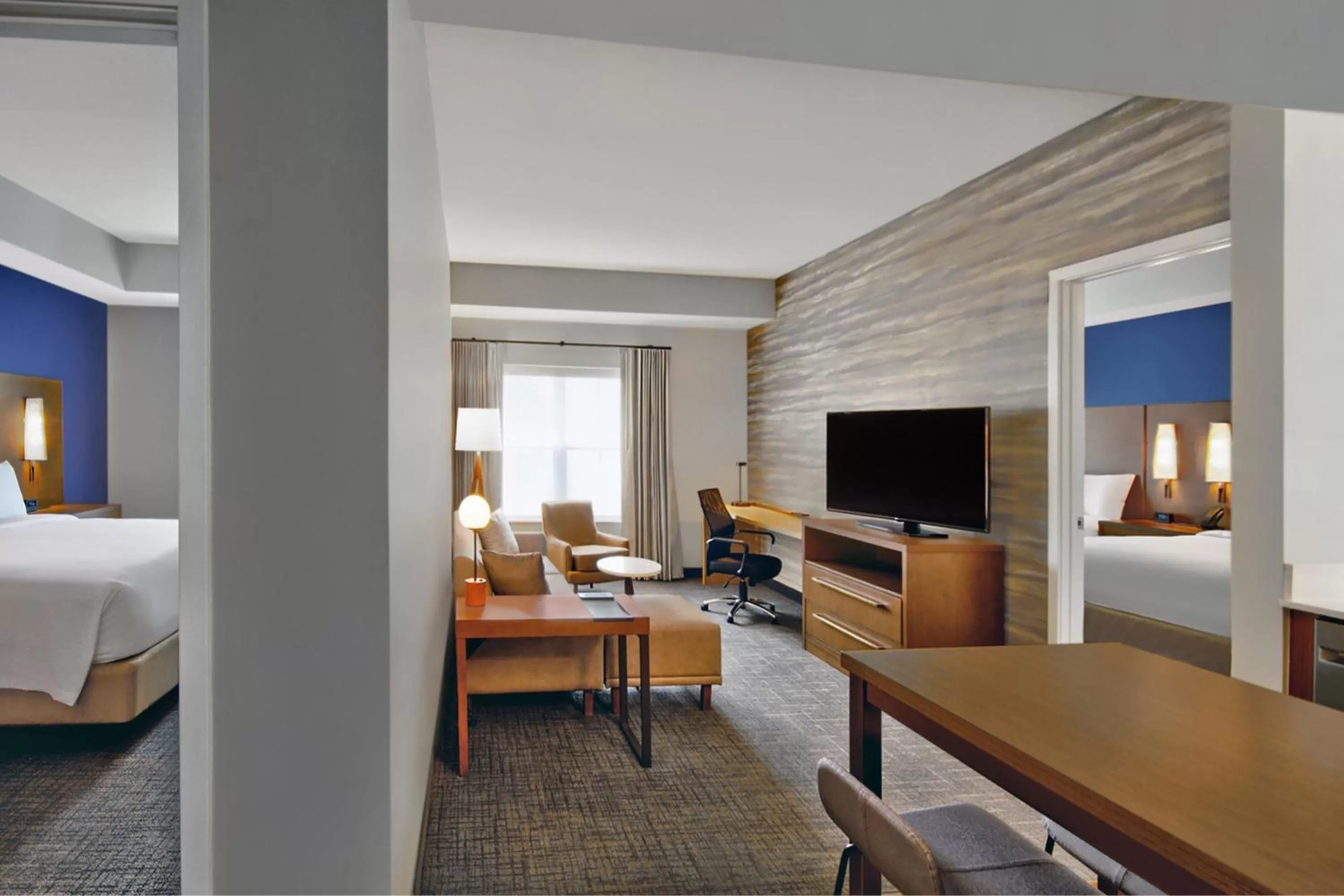 Living room, Bed in Residence Inn by Marriott Orlando at FLAMINGO CROSSINGS Town Center