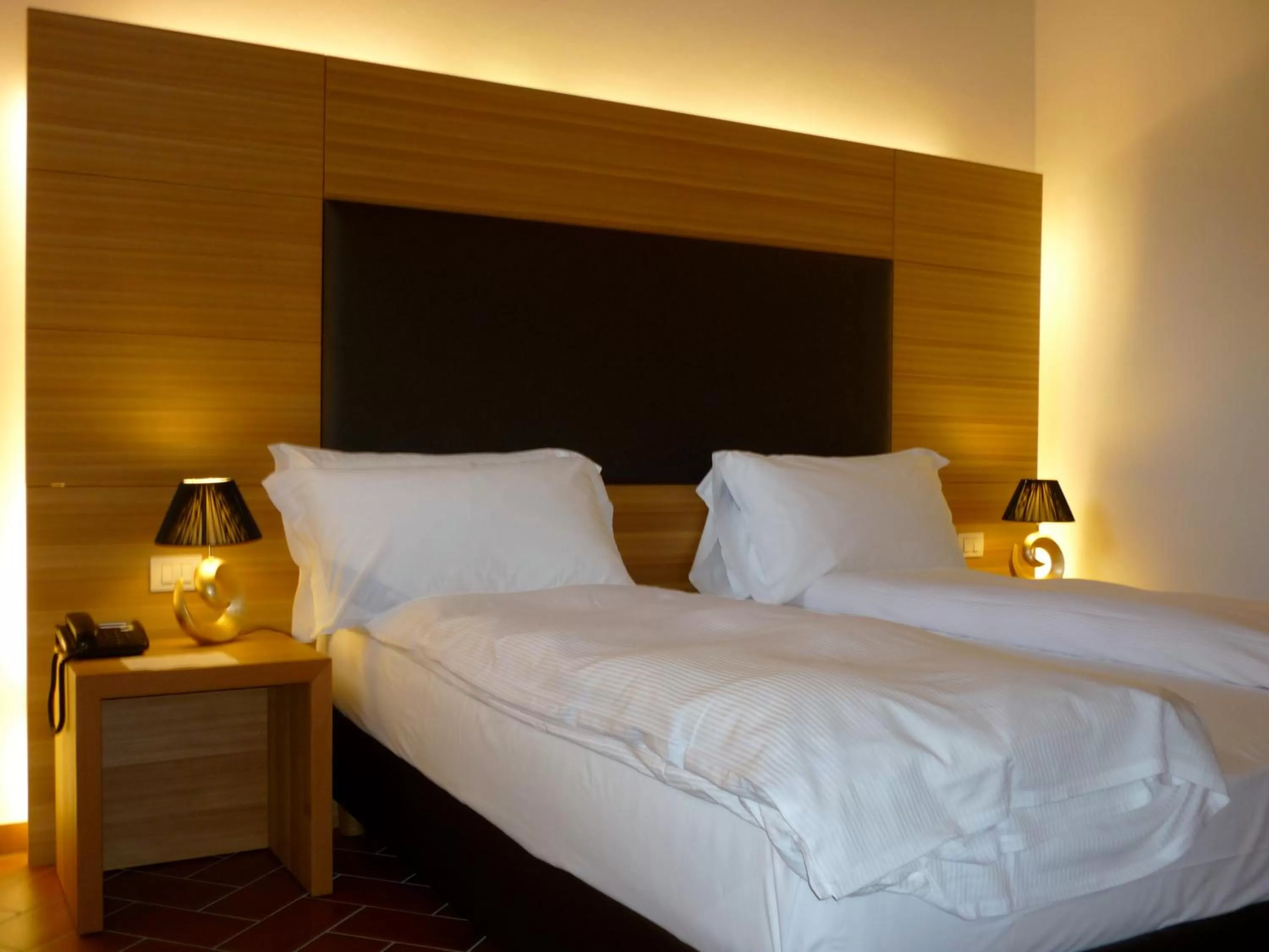 Bed in Relais Palazzo Lodron